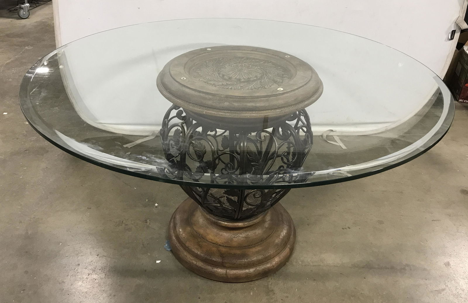 Vintage Glass Topped Dining Room Table: Glass top is sizable, also removable. Base is crafted from metal, depicts interwoven vine like pattern. Measures approx 31 H, and 54 inches W. Wear consistent with age and use. Vintage Dining room tab