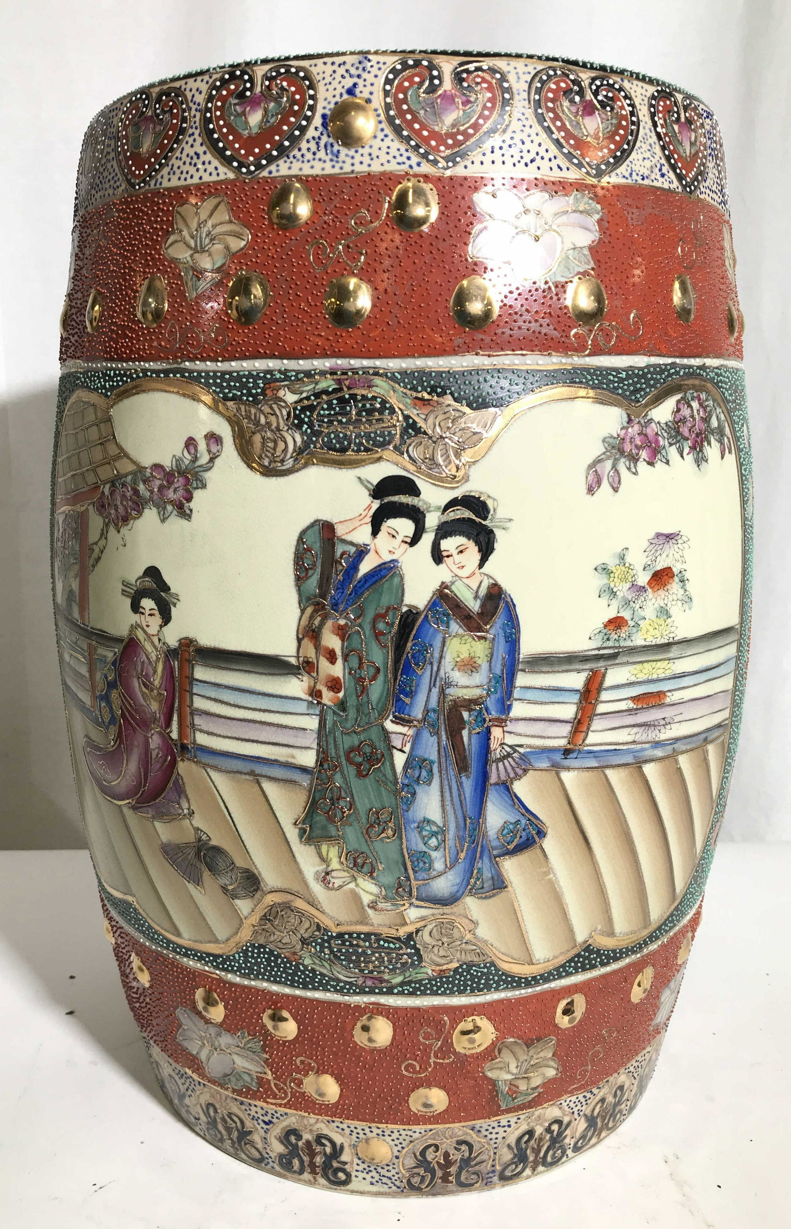 Signed Hand Painted Asian Porcelain Garden Stool: Garden stool is porcelain. Underside signed with asian characters, appears to also be marked as Hand Painted, also reads Royal Sat- rest illegible, possibly reads Royal Satsuma . Contains intricate ge