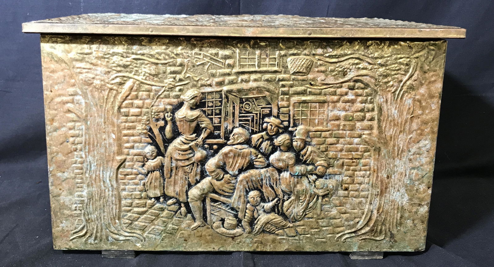 Vintage Bronze Plated Wooden Keepsake/kindling Box: Possibly a kindling box to be kept by the fire. Vintage possibly antique. Bronze toned Plated metal wooden box, front and top relief in bronze depicts a medieval scene of men at a table and a women se