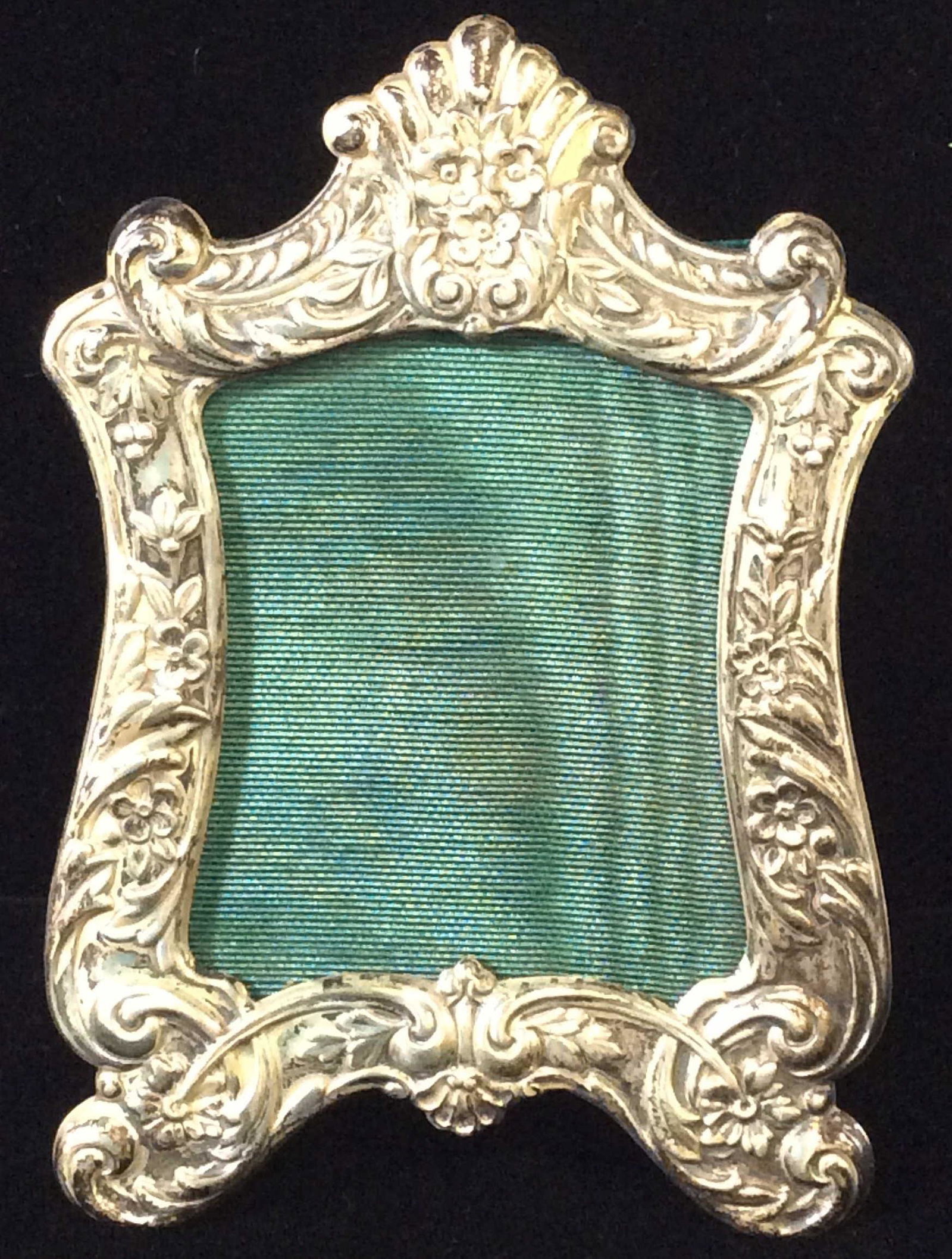 Signed POOLE Baroque Sterling Picture Frame: Poole repousse sterling picture frame in excellent vintage condition. Vintage, Possibly antique. Tabletop Frame, Ornate Repoussé, Green Plush slide in backing with stand. Good shape. Overall size 6 x