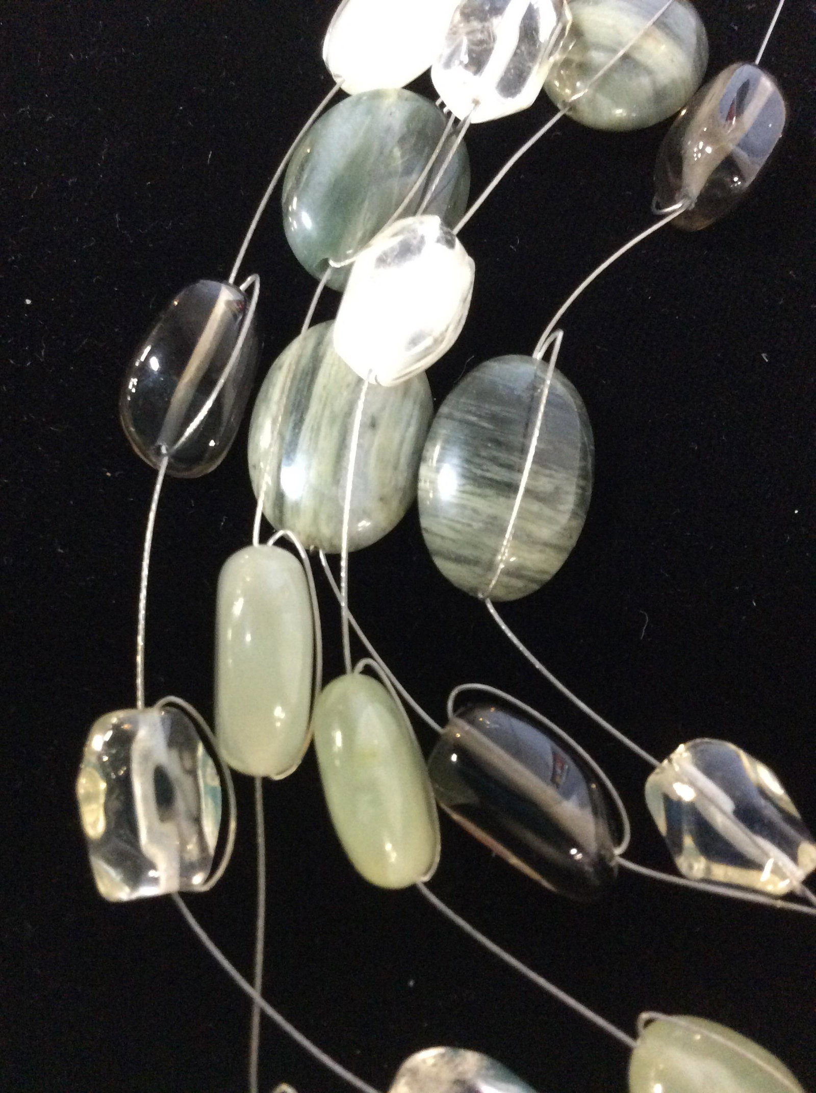 Signed J. Jill Necklace, Bergdorf Goodman Pouch: Adjustable Multi Strand Necklace , longest Sz 14 in. All natural green stones, quartz, more. Avg size stone over 1/2 in. Stones wrapped in silver tone wire, signed J. Jill Charm. Comes with very soft 