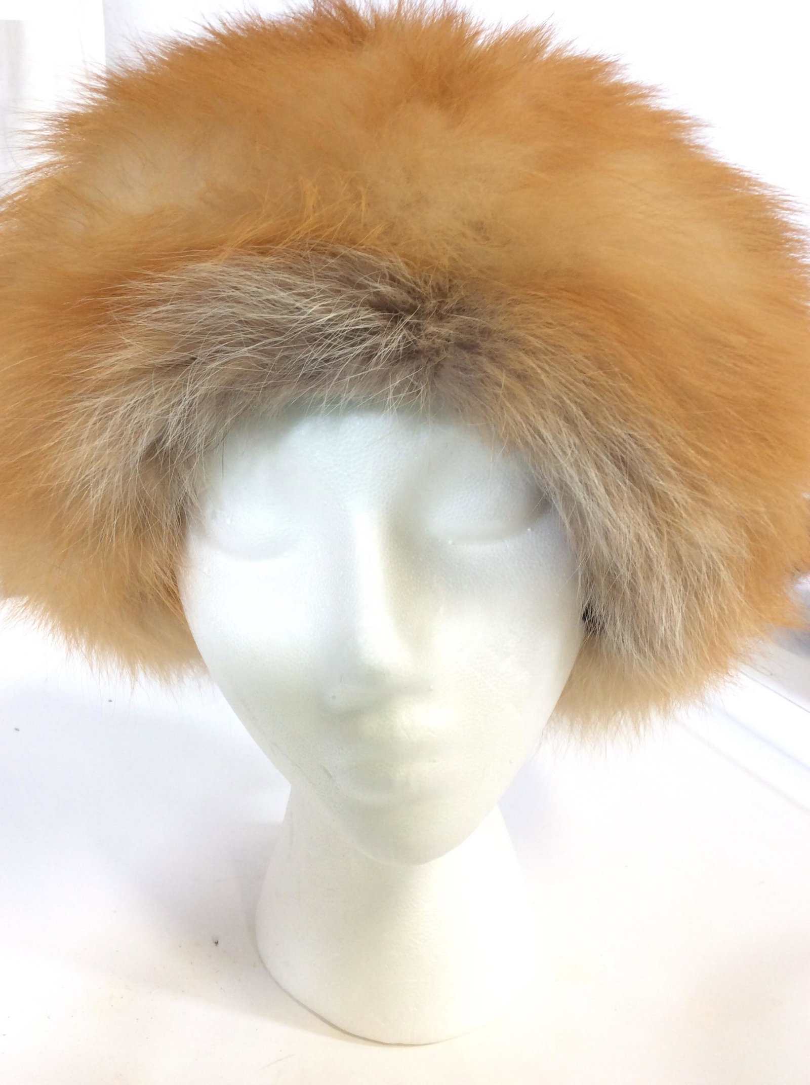Labeled Saks Fifth Avenue Fox Fur Hat: Luxurious vintage fur hat from Saks Fifth Avenue. It is made with extremely soft, reddish auburn/tan Fox fur and lined with a black fabric. Has 2 Pick Combs to stay on head. marked in the interior wit