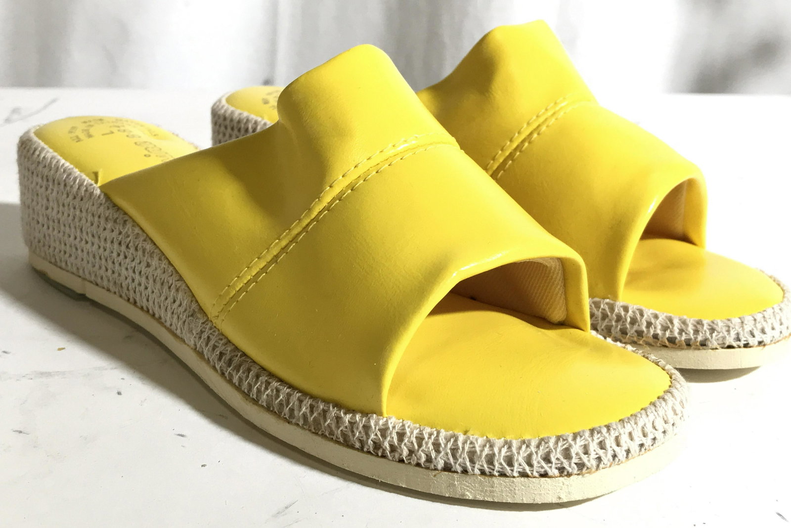 MESSINA Wedged Slides Size 8 8.5: Sole of shoe is marked MESSINA. Slide appears to possibly be genuine leather. Shoes are yellow toned with cream toned wedges. Shoes are size 8 8.5 L. Wedged slides, women’s slides, women’s wedged 