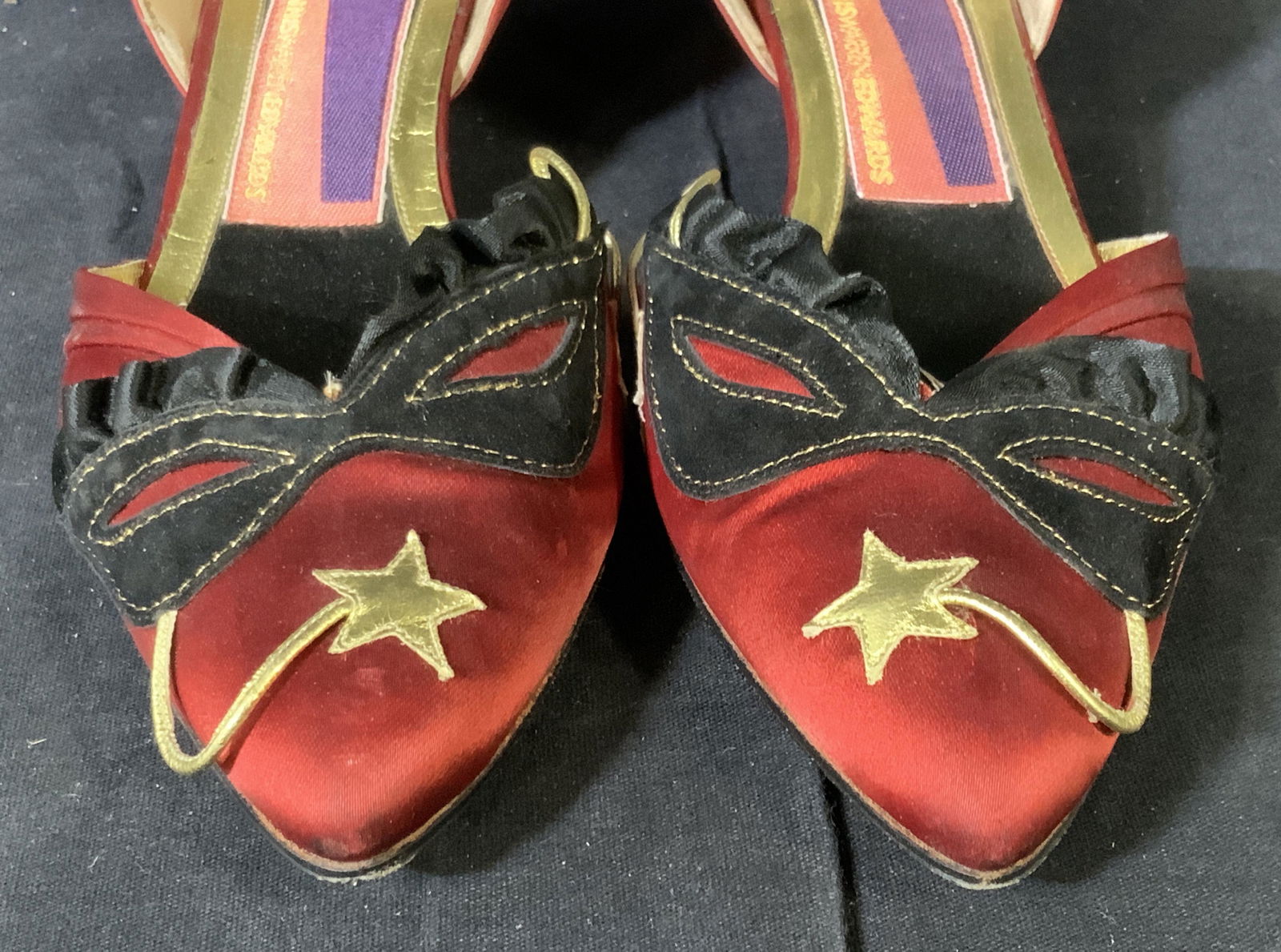 Vintage Susan Bennis Warren Edwards Shoes: Vintage Susan Bennis Warren wine colored pointed toe shoe, black appliqué design of eye mask with gold stitching and some gold stars on the front too, on the back of the shoe are two gold stars each,