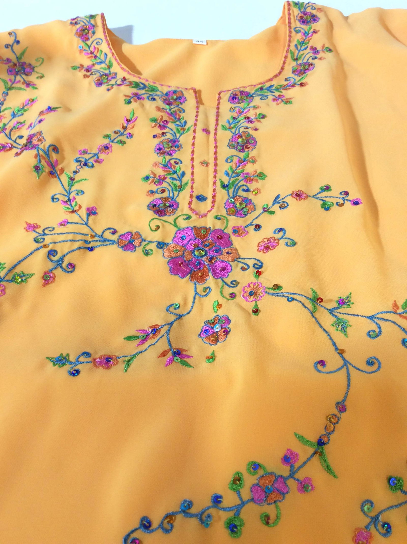 Ladies Long Sleeve Floral Embroidered Blouse: Bright colors, neon orange fabric, vibrant green, blue, pink embroidery. Floral vine design on sleeves and front. Size 44. Double layered blouse. Ladies Blouse, Flower Embroidery, Neon Colors, Fashion
