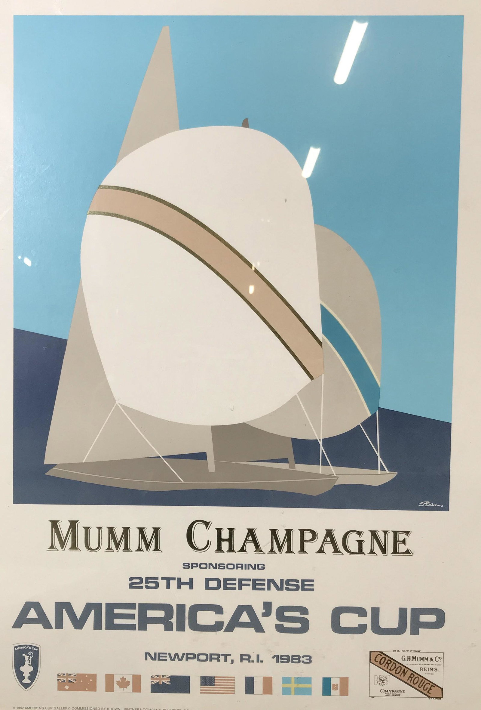 Mumm Champagne America’s Cup Lithograph: Mumm champagne America’s cup lithographic poster, lithograph depicts two boats on a minimalist water scene, signature in the lower right corner reads S.Baus, text to poster reads ‘Mumm Champagne, 