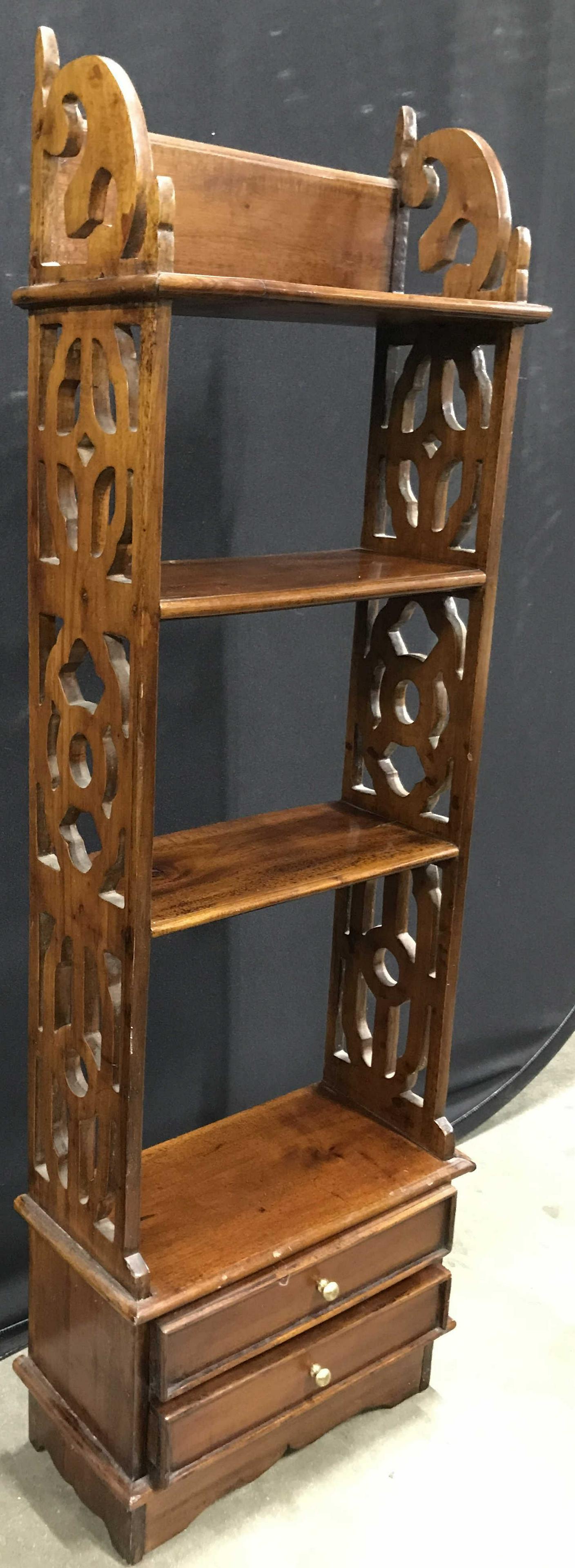 Vintage Carved Wooden Wall Shelf W Drawers: Wall shelf is wooden. Piece appears to be vintage possibly antique. Wall shelf is possibly hand carved. Piece can be utilized as floor shelf. Piece has 2 drawers each with gold toned handles. Drawers 