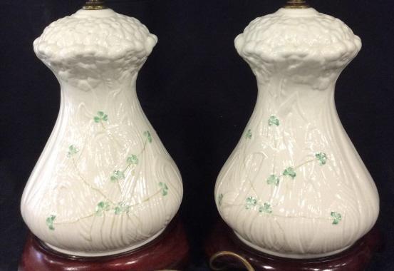 Pair BELEEK Shamrock Porcelain Lamps, Ireland: Unique to Ireland, BELEEK is the finest Irish Porcelain. Size: 23in. H x 7.5 in. W Brass finial acorns. One harp fitter is larger than the other and can be changed. 6 ft cord. BELEEK ‘Daisy’ Colle
