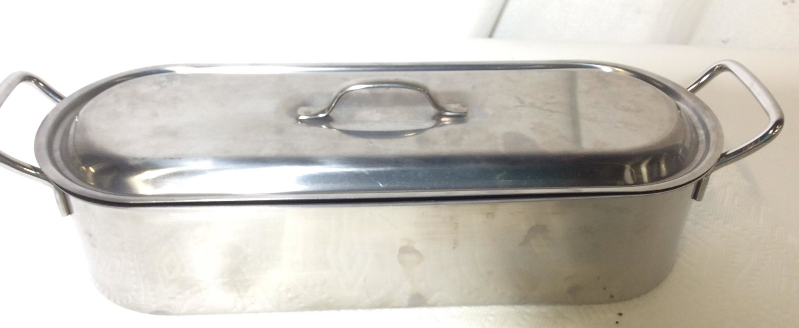 Handled Fish Poacher, Kitchenware: 18.25 in L, 6 in. W, 4.5 in. Ht ( Handles) , poacher depth 4 in. Perforated Lifting tray, lid. Stainless steel. Fish Poacher, Boil Ware for fish, Kitchen Cooking Accessory, Steam Fish, Fish Cookware ,