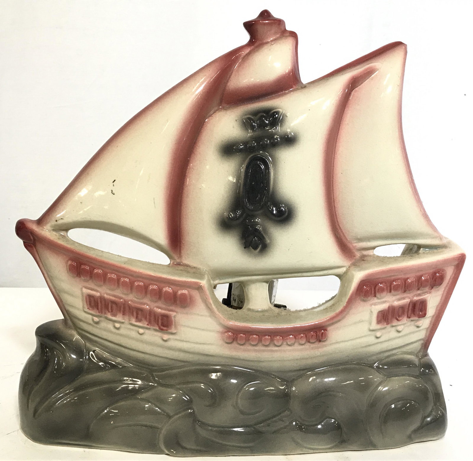 Porcelain Nautical Ship Lamp: Lamp appears to be porcelain possibly ceramic. Lamp is in the shape of a ship. Piece appears to have been airbrushed, or spray painted. Boat lamp, ship lamp, nautical lamp, porcelain ship lamp, porcel