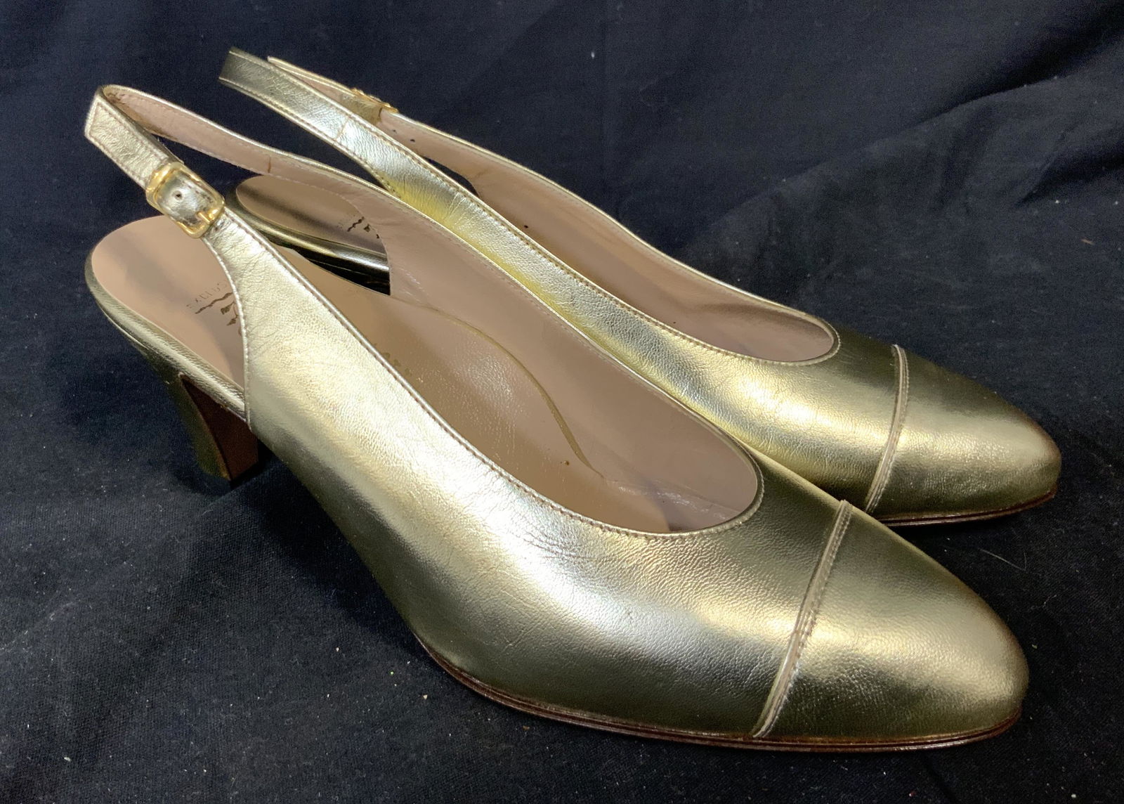 Pair of Vintage Ballotta of Bologna Heels: Pair of Vintage Ballotta of Bologna Heels, sling back high heels in gold leather, shoes are a size 8, and the heel is 3 inches tall, made in Italy, good condition, ready to wear, gold clasp, shiny as