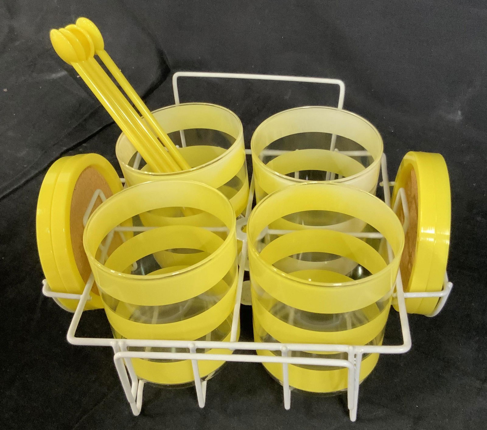 Yellow Toned Glass Drinks Set: includes four stripped yellow and clear cups, four plastic and cork coasters, four long spoons and caddy to hold it all in, light weight, dishwasher safe, vibrant and colorful, Tea set, lemon aid set,