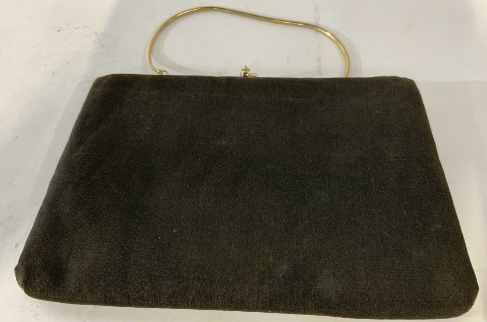 H1 USA brand vintage handbag: Minimalist H1 USA Brand clutch, with gold color fixtures, cross cross gold color alligator mouth closure in simple gold colored metal, small chain strap can be used but also can be tucked inside the p