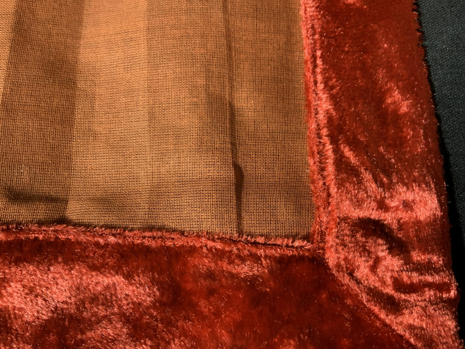 New in Packaging Set of Six Decorative Napkins: Set of 6 napkins in sheer burnt orange with red velvet trim, napkins match previous lot of orange tablecloths, velvet on the table clothes, as if part of a set, bright and vibrant color, felted velvet
