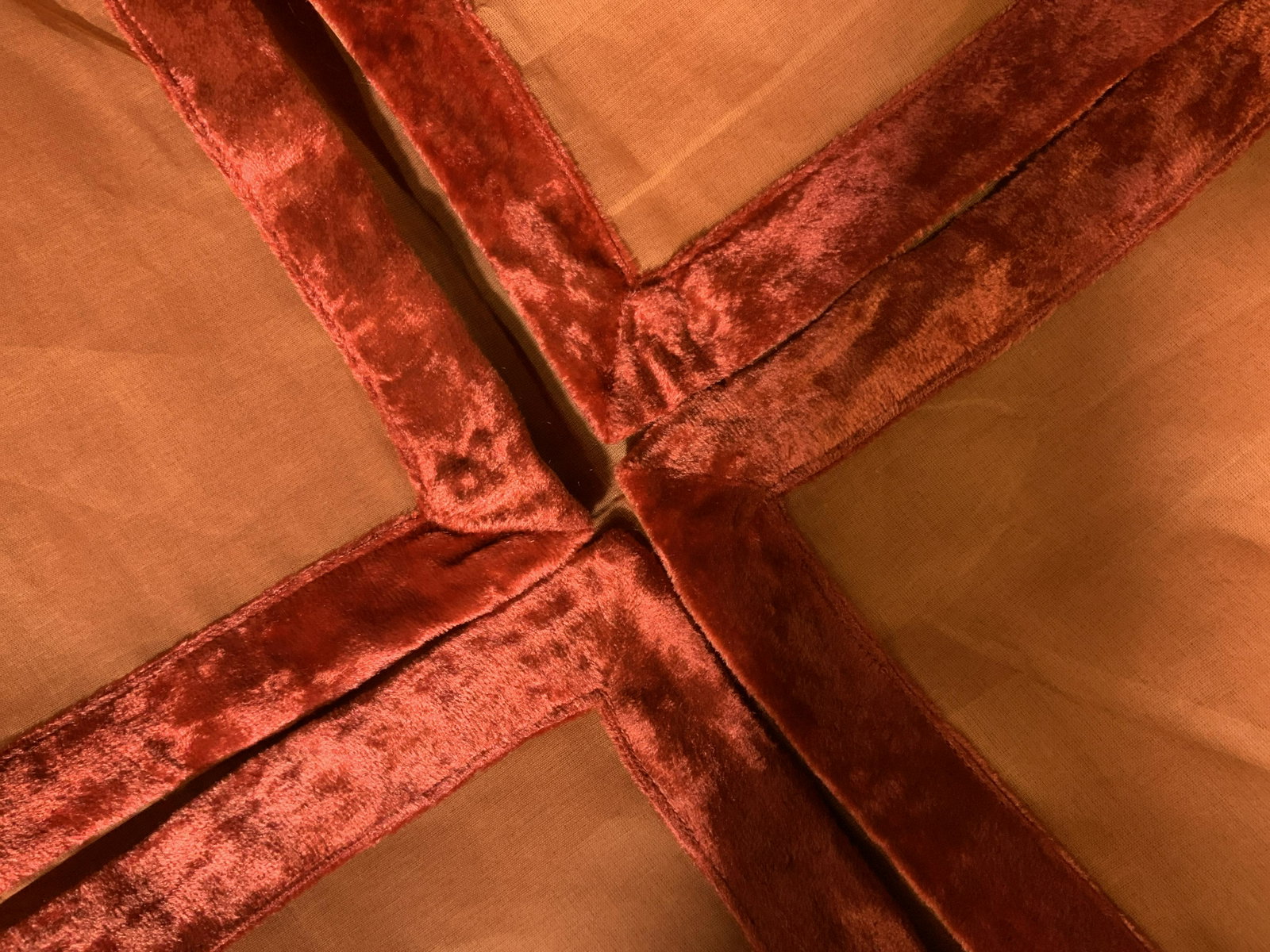 New in Packaging Set of 6 Decorative Napkins: Set of 6 napkins in sheer burnt orange with red velvet trim, napkins match previous lot of orange tablecloths, velvet on the table clothes, as if part of a set, bright and vibrant color, felted velvet