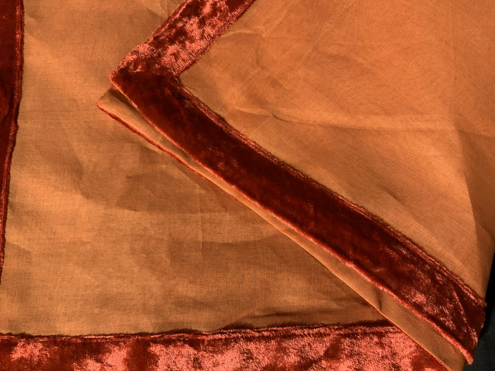 New in Package Set of 6 Decorative Napkins: Set of 6 napkins in sheer burnt orange with red velvet trim, napkins match previous lot of orange tablecloths, velvet on the table clothes, as if part of a set, bright and vibrant color, felted velvet
