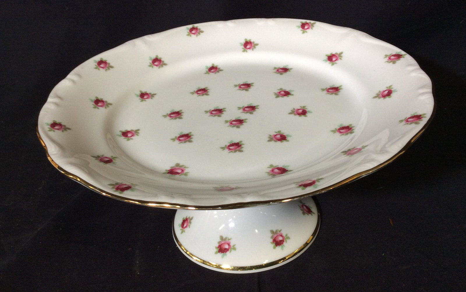 Bayreuth Gloria Rose Porcelain Cake Pedestal: Vintage Cake pedestal, Marked ‘Gloria Fine Porcelain Bavaria Handwork Bayreuth West Germany’. 10in. W x 5in. H good condition. Solid Gilt rims. Fine China Cake Tazza, Cake Pedestal, Vintage Gloria