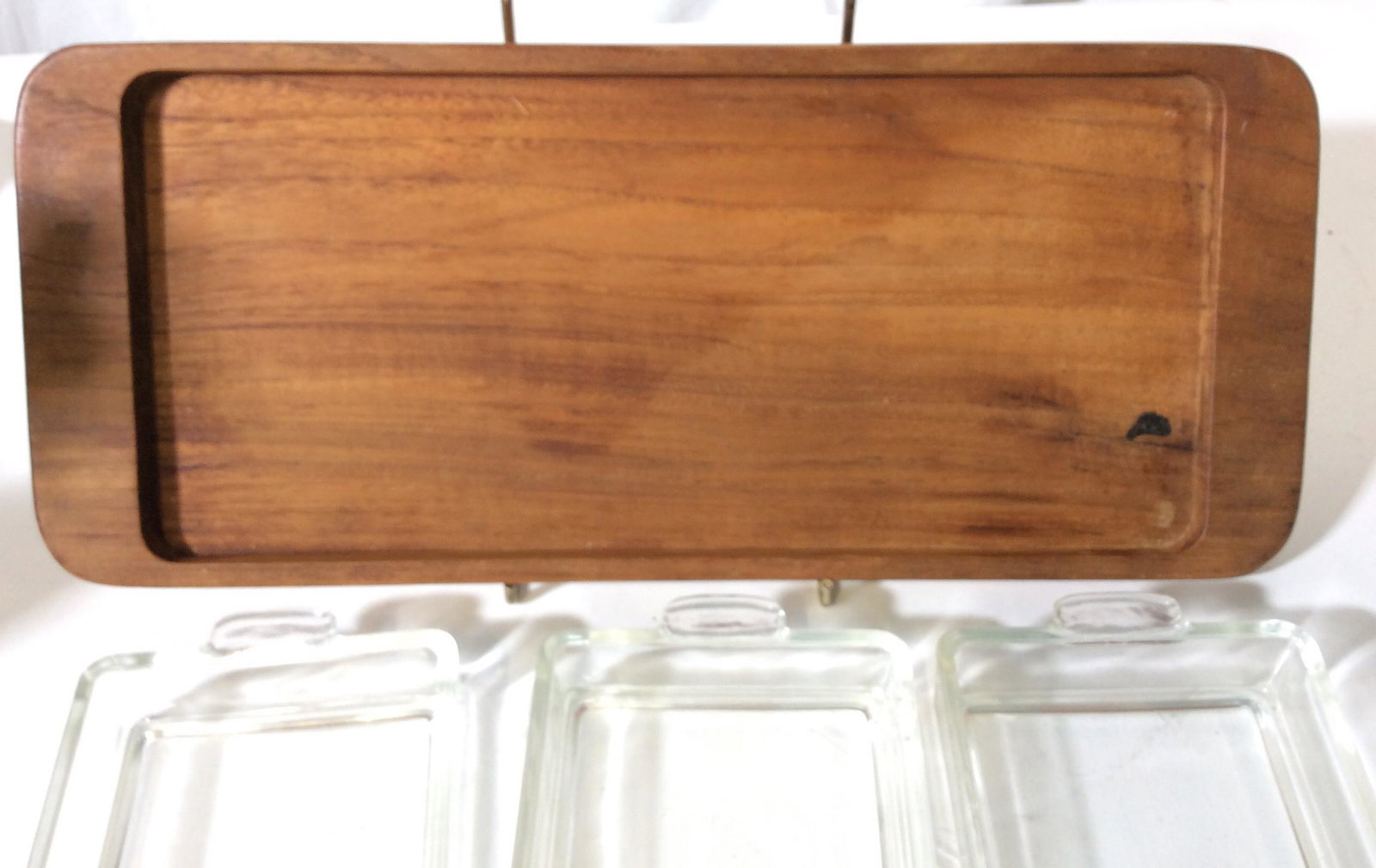 Teak Tableware, Denmark 2 pieces: Vintage DANSK Salt or pepper cracker. Possibly Teak. Appetizer Tray with 3 glass Serving Dishes, Teak Wood, Marked ‘ESA DENMARK’. Can make out word ‘teak’. 13 3/4 x 6 in. Tabletop Serving Obje