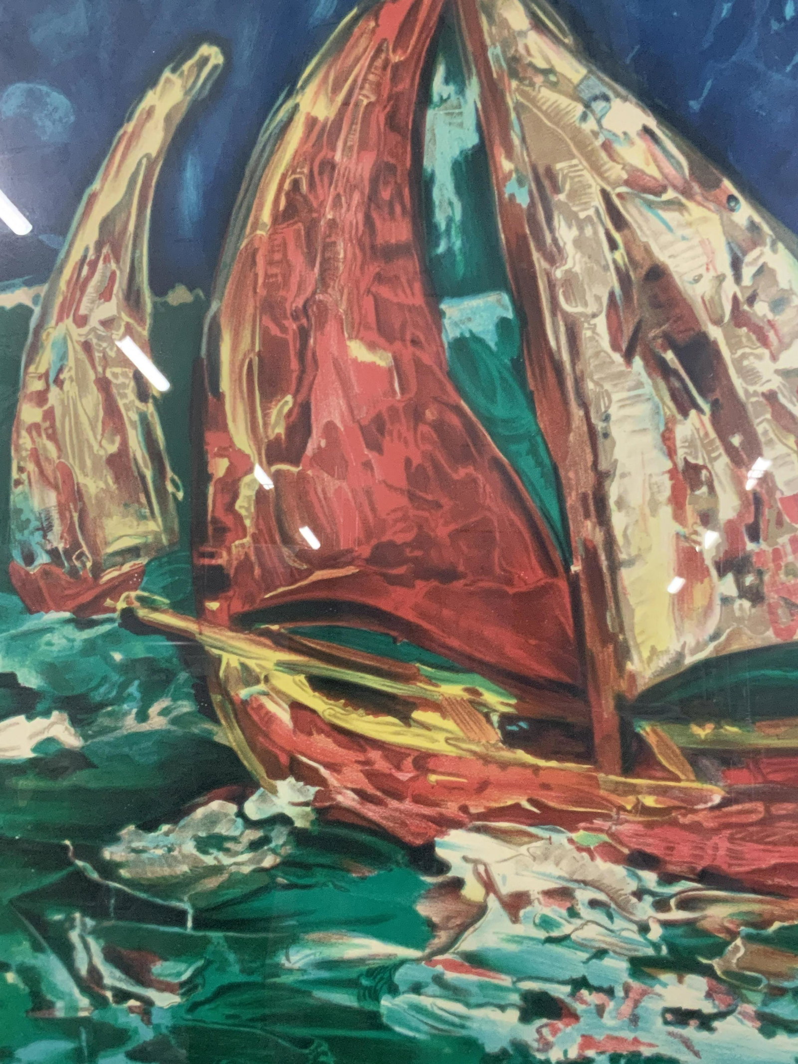 Signed Lithograph of Boats at Sea: This colorful lithograph depicts ships at sea, potentially during a storm, the body of the boat is red and yellow and one sail is red with yellow detailing while the other is a hodgepodge of color sha