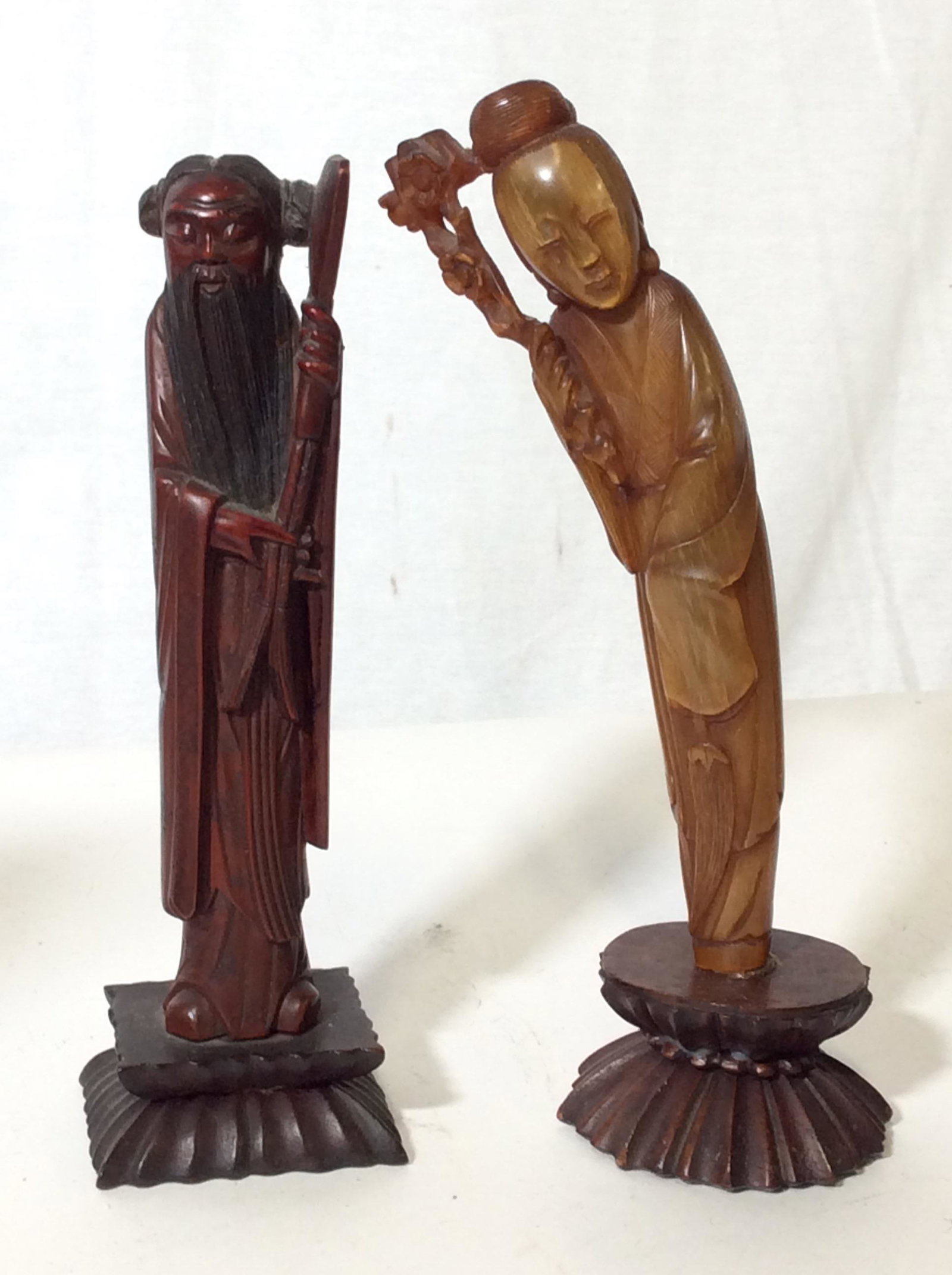 Lot 6 Carved Dark Wood Shelf Objects: Pierced Carved Trivet Made in India. Pair Carved Chinese Male & Female Figurals On stands, Made in China. Handmade Piano Figural. Carved Wood Figural Of MOSES. Flat Book Shelf with sliding Books Ends 