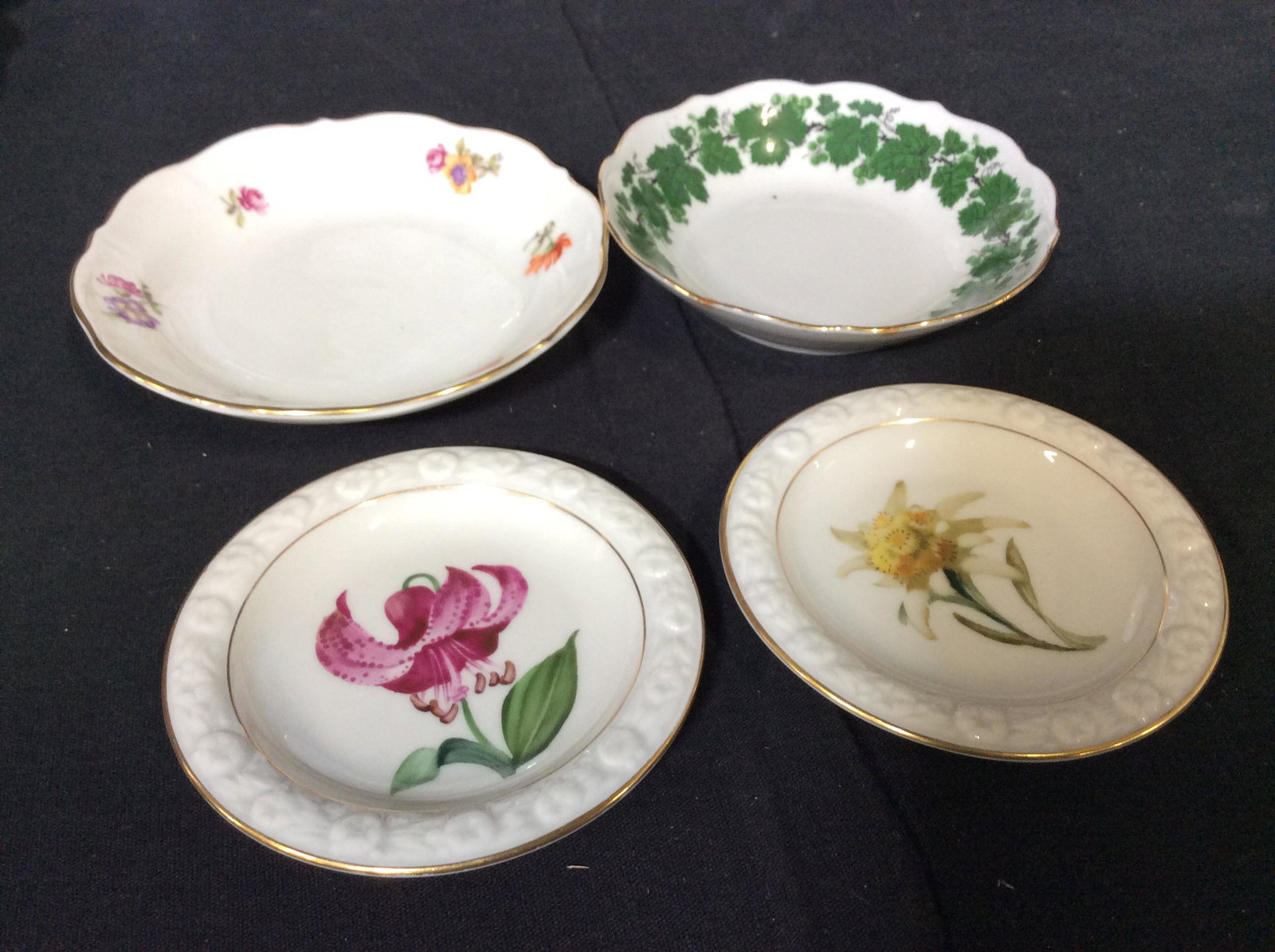 Lot 8 Hand Painted European Plates: Fruit Platter/ Plate 10 1/4 in. Marked TOSCPORT CZECHOSLOVAKIA. Pair Tea bag rests marked ROSENTHAL SELB GERMANY MARIA. Trinket Dish Gilt rim petite floral Marked SCHEMIA MADE IN CZECHOSLOVAKIA BETH W