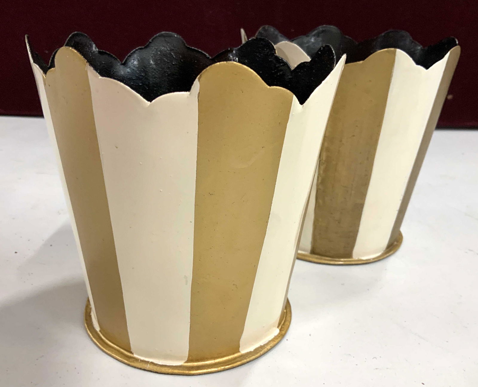 Pair Gold Cream Striped Metal Cache pots: Painted metal vessels, planters, cache pots, vases, decorative objects, made in India, each measures ht 5.5 inches, diameter