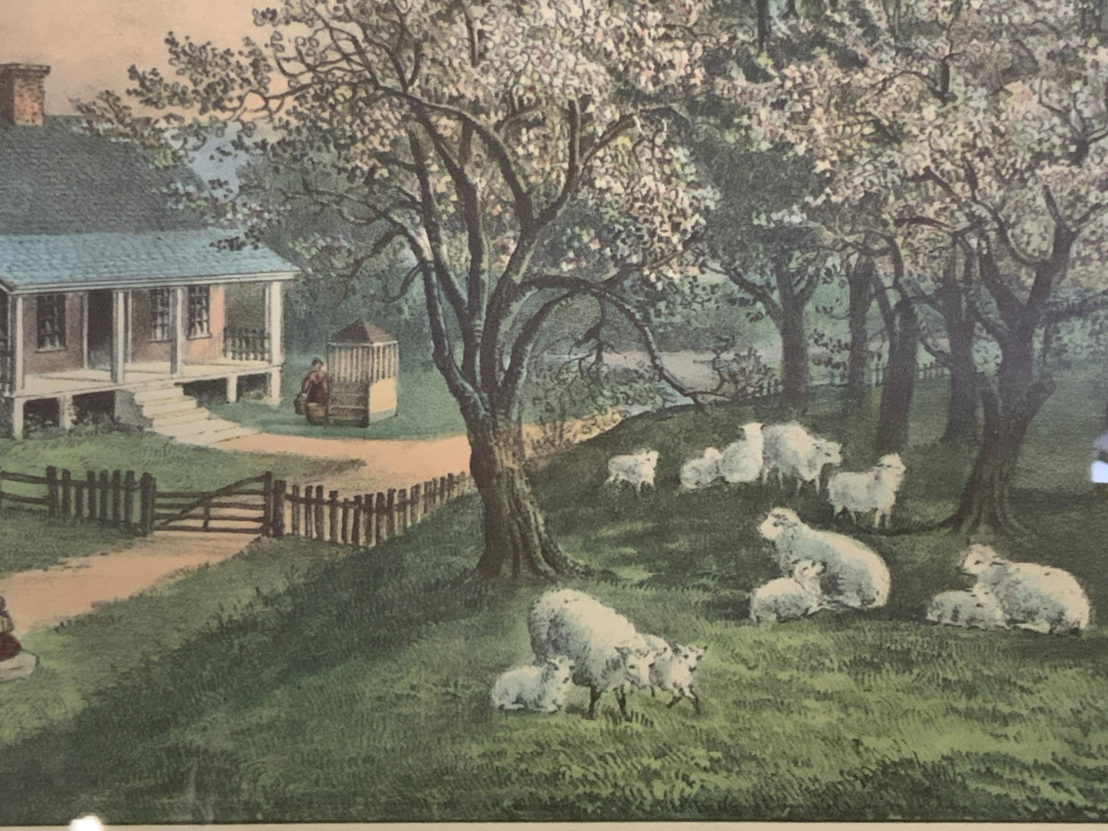 Set of Two American Homestead Lithographs: Set of Two American Homestead Lithographs this set has Spring and Summer, the Spring image depicts a small country house with fields in the background sheep in the front yard playing and laying under 