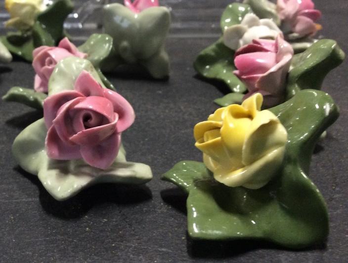 Dresden Flower Porcelain & Glass Tableware: Novelty Tableware of fork & knife rests and Porcelain Flower Figurines, Flowers All Stamped In blue ink Dresden with royal crown over ‘N’. 16 total, 2 need repair. Glass fork & knife rests made of