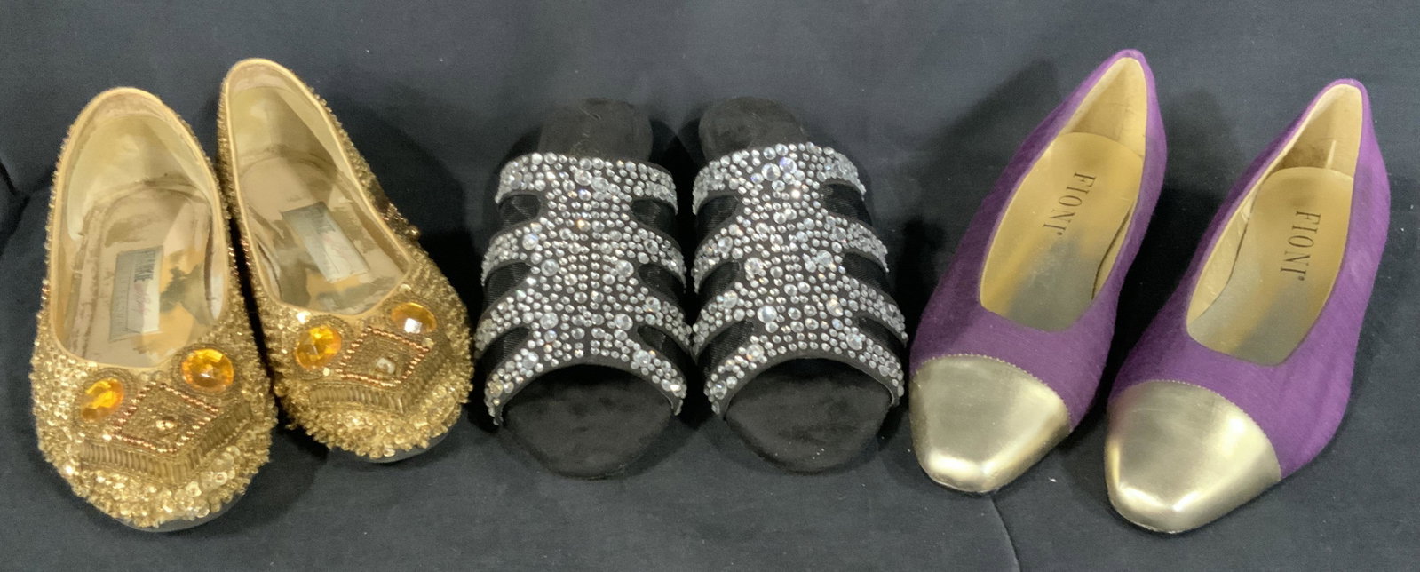 Set of 6 Pairs of Vintage Sparkly Shoes: Six pairs of vintage shoes of varying designers including Fioni size 7.5, a purple linen pair with gold toes and a gold 1.5 inch heel, Two pairs of Joan Boyce pairs in different color, both 7.5 bedazz