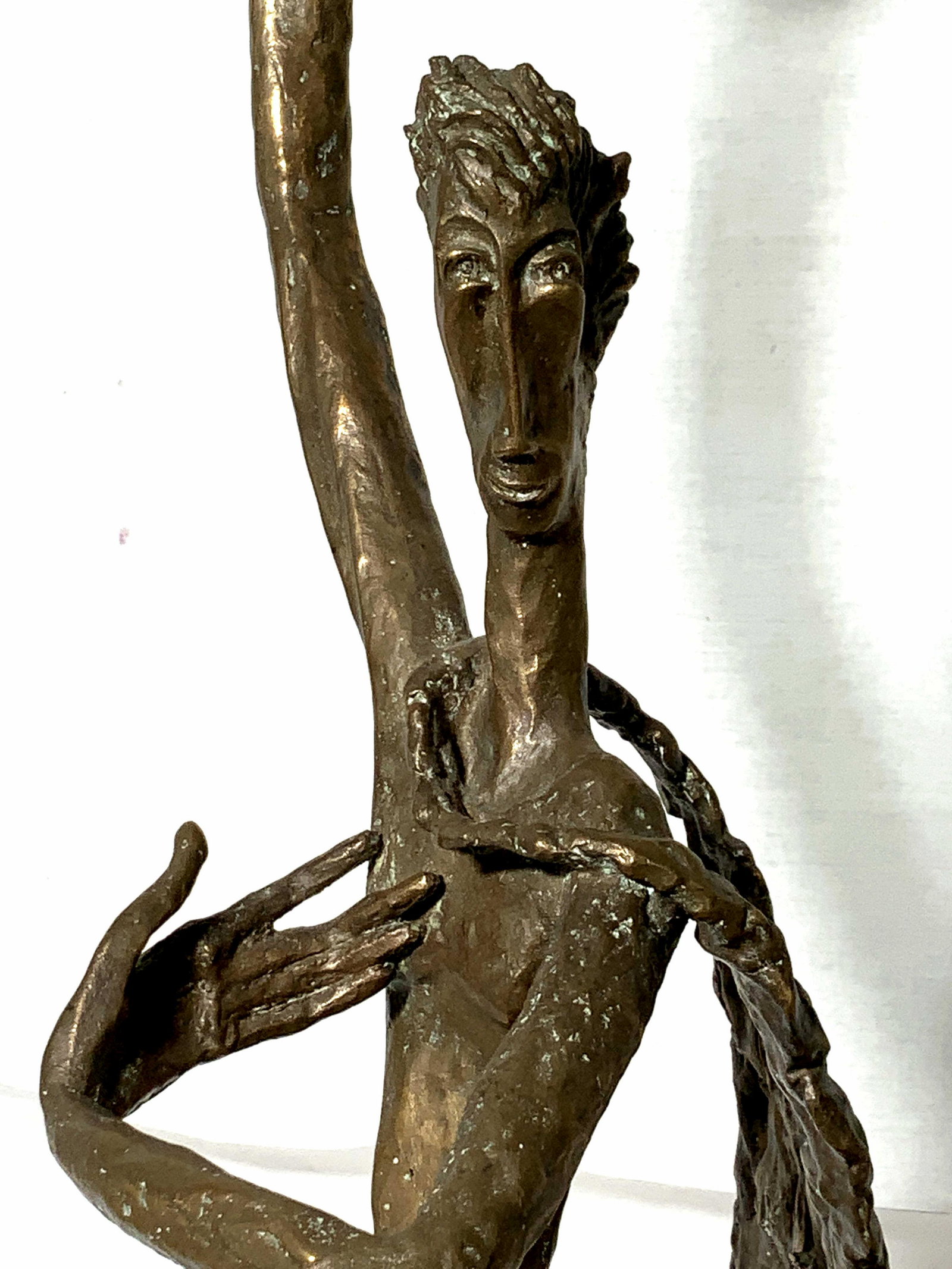 Large Modernist Bronze Nude Abstract Figure: A signed and dated Estelle Goodman (1930-2007, American) nude bronze figure with a long flowing cape behind them. The figure has an elongated and outstretched body with a hand raised in the air and on