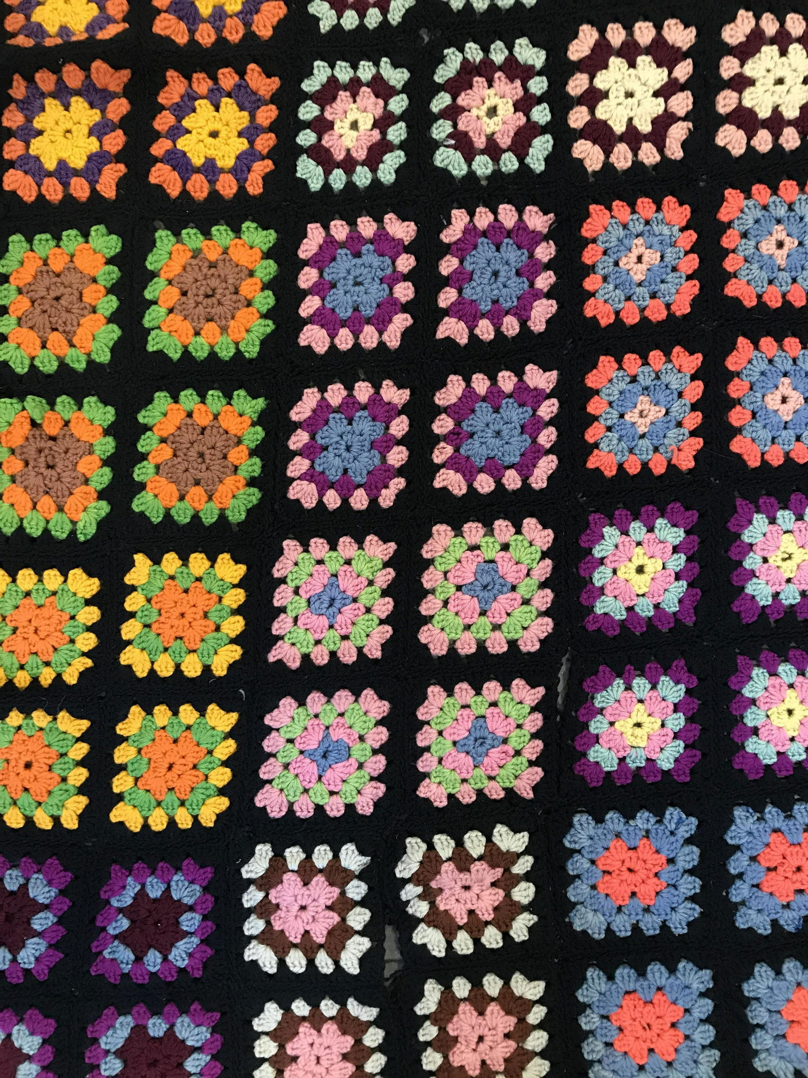 Vintage Multi Toned Crochet Blanket: Blanket is vintage. Piece has multi toned pattern detail. Piece is possibly hand woven. Piece appears to possibly be wool, possibly cotton. Blanket, woven blanket, crochet blanket, vintage Blanket, vi
