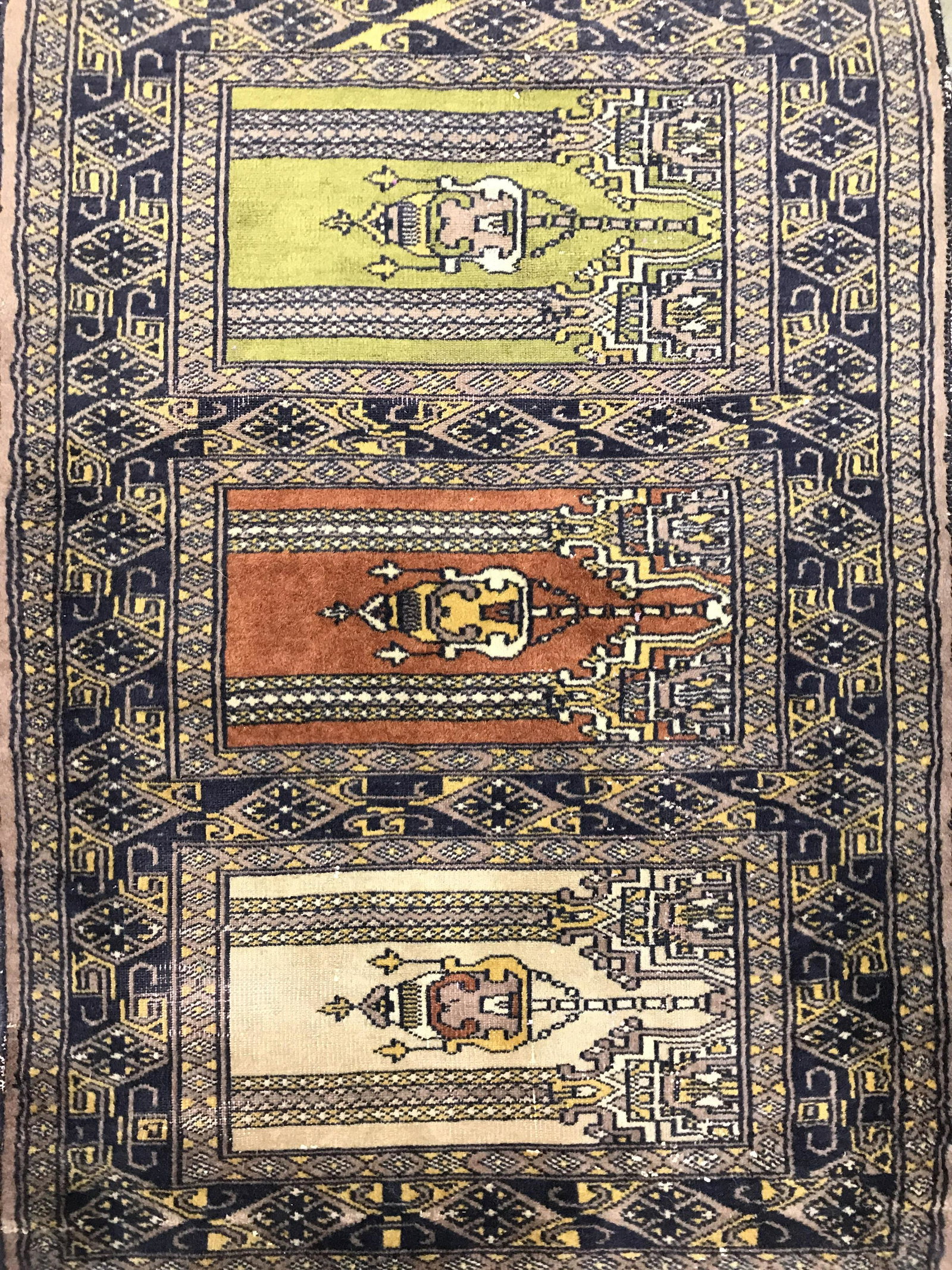 Vintage Prayer Size Handmade Wool Rug: Rug is wool and handmade. Piece is vintage possibly antique. Rug is fringed. Piece is petite in size. Contains intricate multi toned geometric detail. Rug, carpet, area rug, wool rug, handmade rug, te