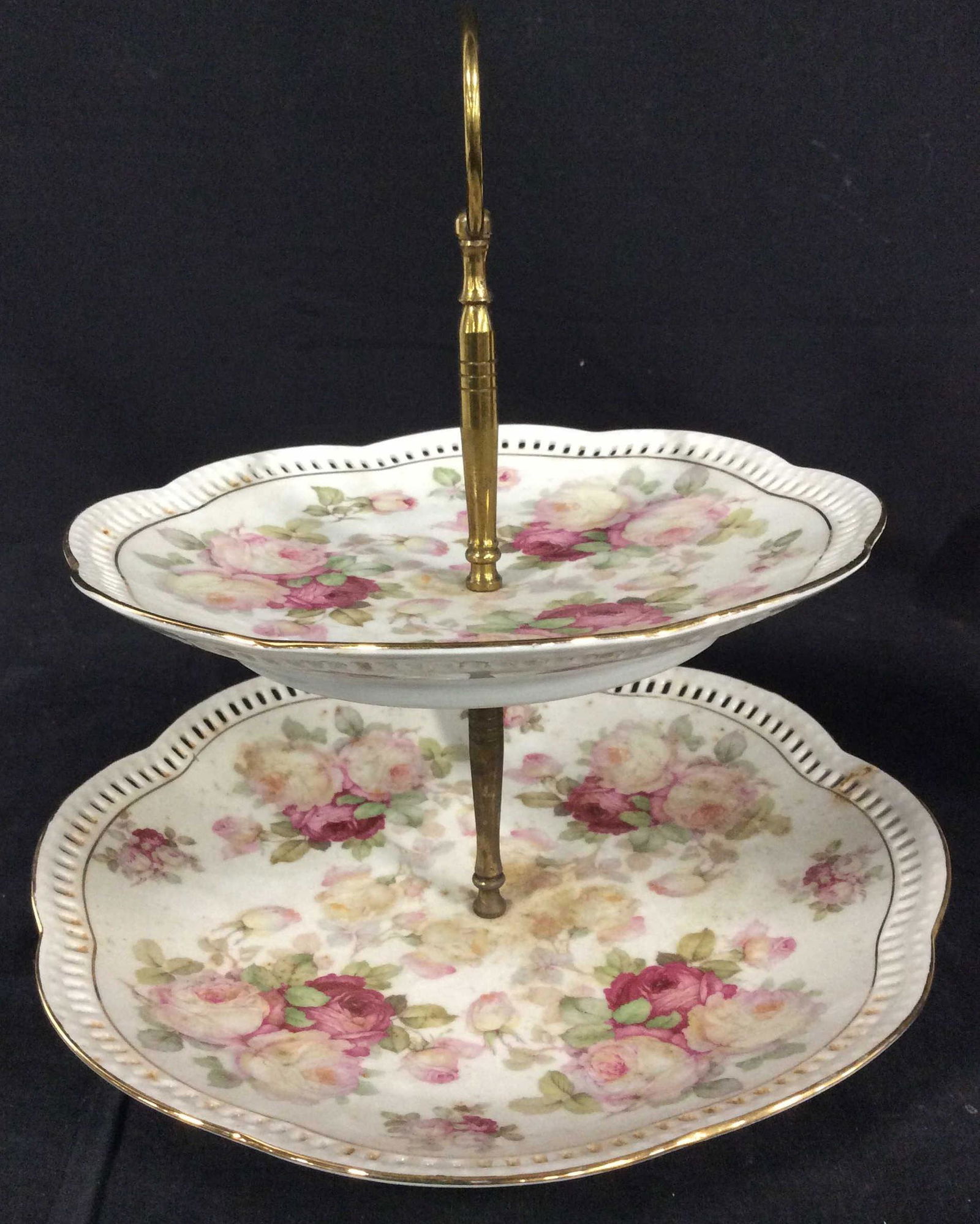 Schumann Rose Porcelain Tiered Server, Grrmany: Possibly antique, Gilt & Pierced rim, brass center pole handle, large hand painted roses over glaze, Hallmarked ‘Schumann, Arzberg GERMANY’. Ht 10 in. Wider plate 10.5 in diameter. Antiques, Colle