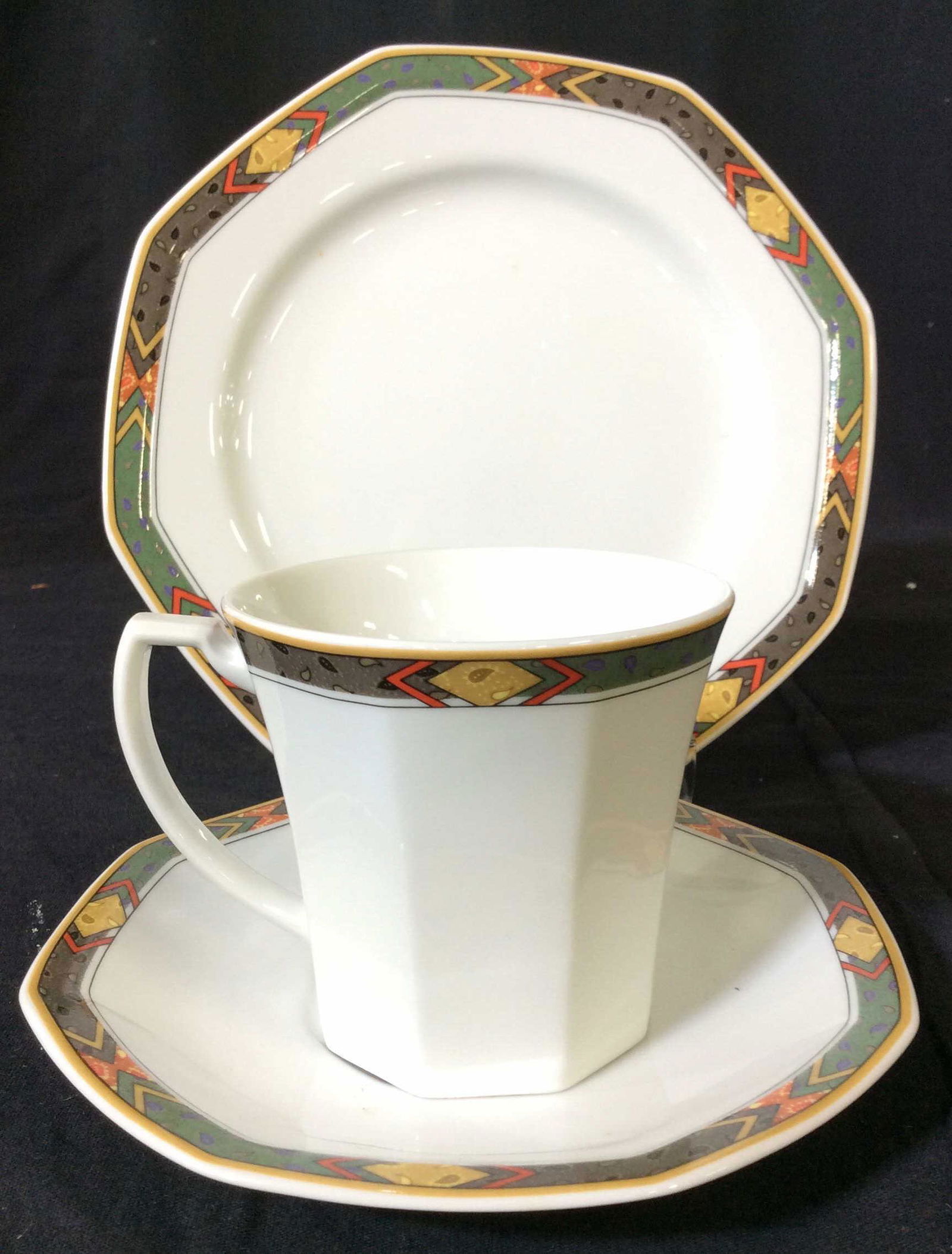 Christopher Stuart Dhurrie China Plate Set, 20 pcs: Octagonal Shaped Plates, Pattern Dhurrie, 8 Luncheon Plates app 8 in. 7 tea Saucers. 5 coffee cups. All Hallmarked pattern number Y0045. Micro, oven, dishwasher safe, Made in Thailand. Like New. Porce
