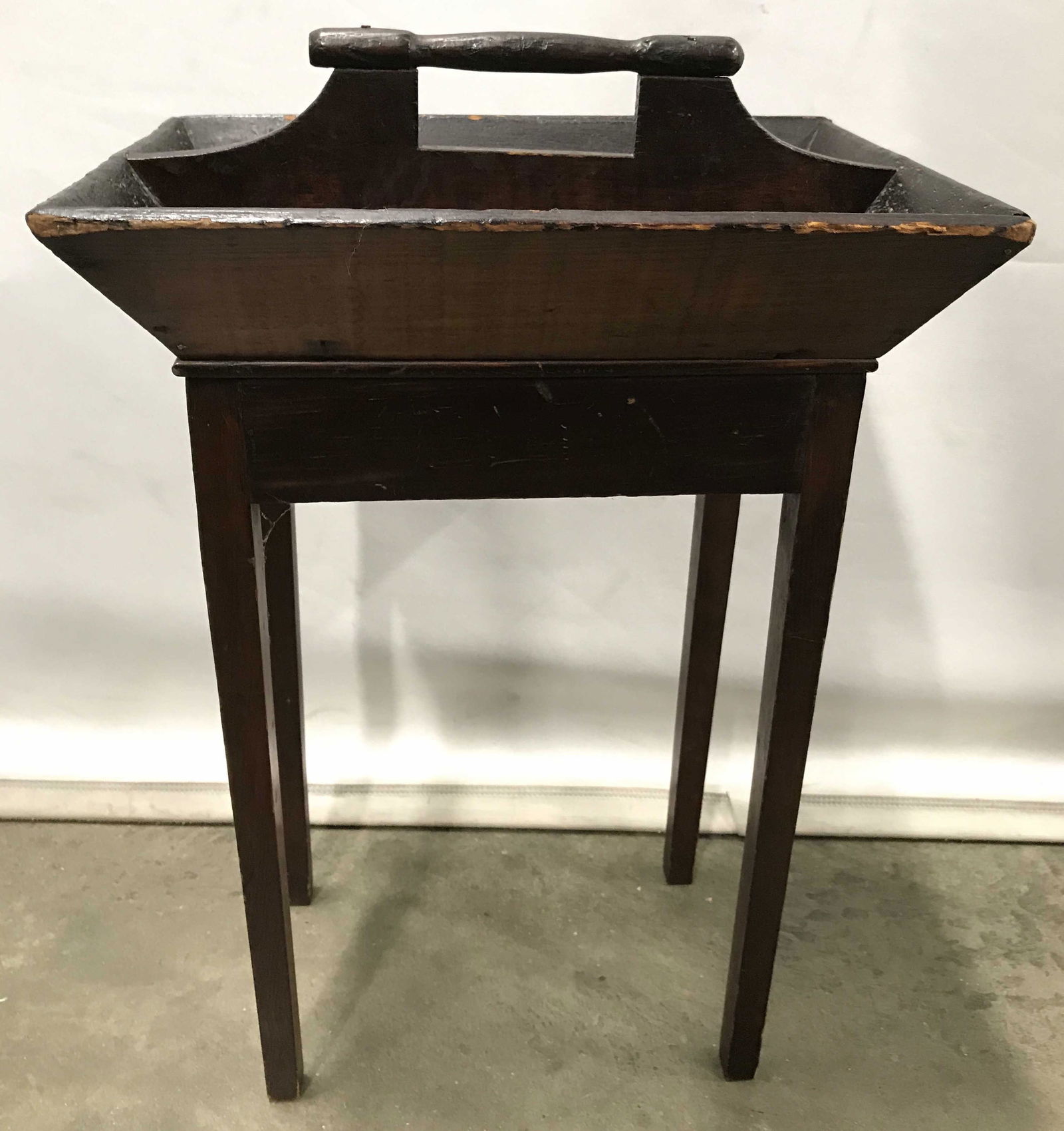 Vintage Wooden Planter Box Table: Table is brown toned and wooden. Piece appears to be vintage possibly antique. Tabletop is sectioned off into 2 areas. Top also has handle. Piece measures approximately 19 inches tall 13 inches wide 9
