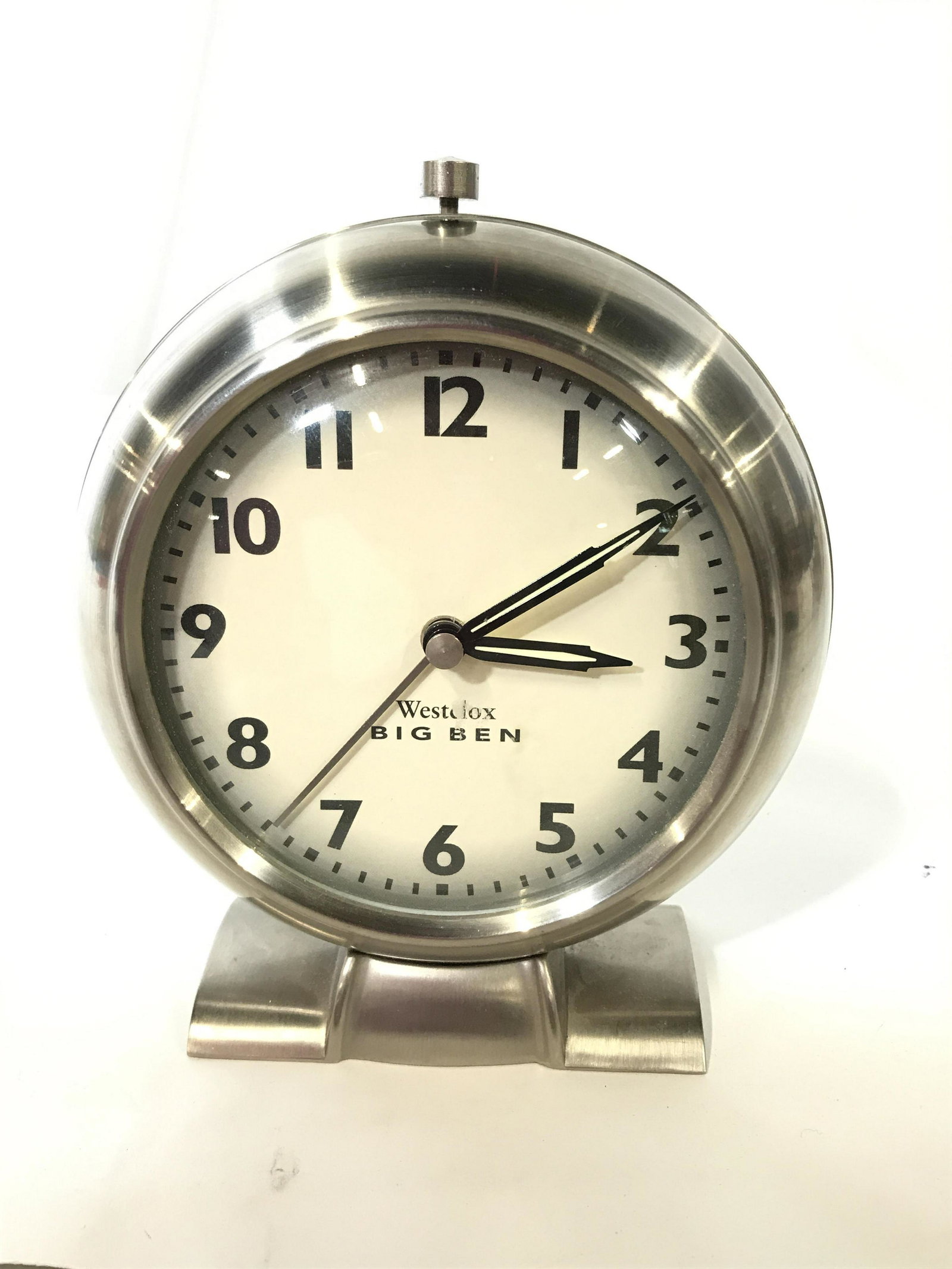 WESTCLOX Desktop Clock: Desktop clock. Brushed metal finish, face reads WESTCLOX, BIG BEN. Measures approx 6.25 inches H, and 5.25 inches W. Clocks, desktop clock, desktop accessory, shelf accessory, mantle accessory. 9