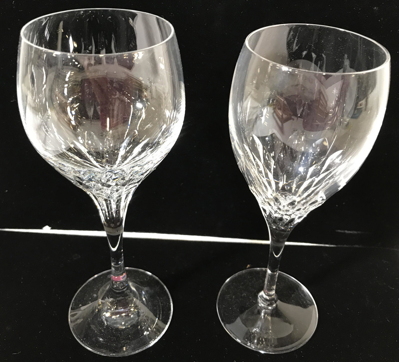 Lot 7 Cut Crystal Wine Glasses: Cut crystal wine glass. Several are from a set, the letter Z Inscribed on the underside of their bases. Largest glasses measure approx 8 inches H, and 3 inches W. Cut crystal, cut glass, crystal wine 