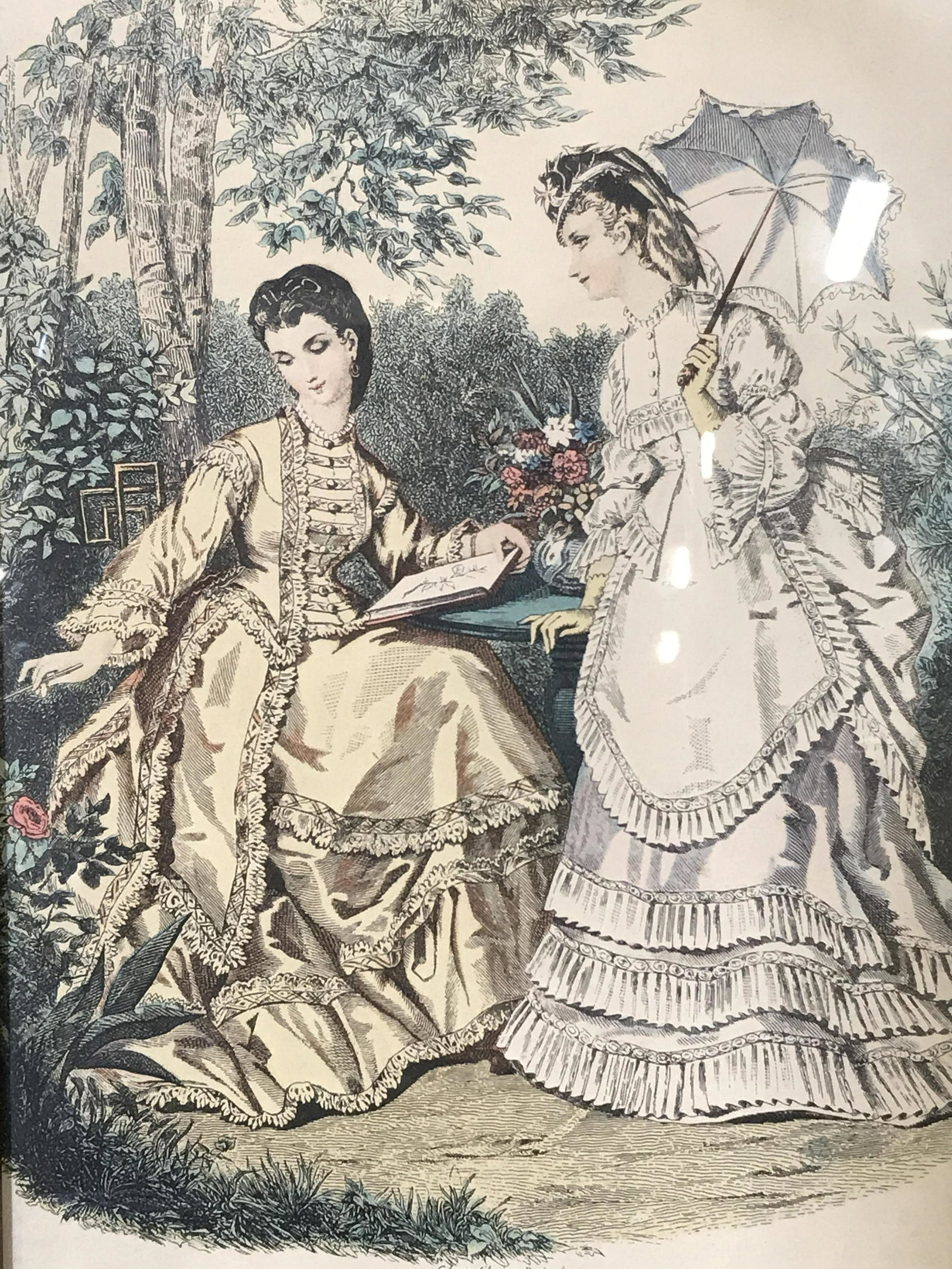 Framed French Engraving, Ladies in Garden: Framed French Engraving, subject two women in large gowns seated in a garden setting, title to lower border reads ‘La Mode Illustrée’, text above title reads ‘Gilquin fils imp Paris’, gilt wo