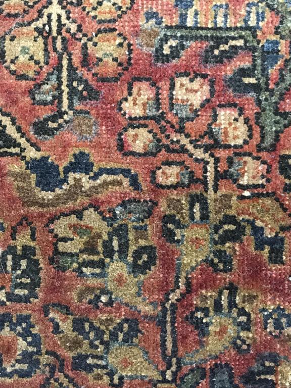 Antique Persian Handmade Wool Rug: Rug is handmade and wool. Rug has intricate multi toned floral leaf and vine detail with tones of navy, green, sand, & dark coral red. Rug measures approx 60 inches long 40 inches wide. Rug, carpet, w