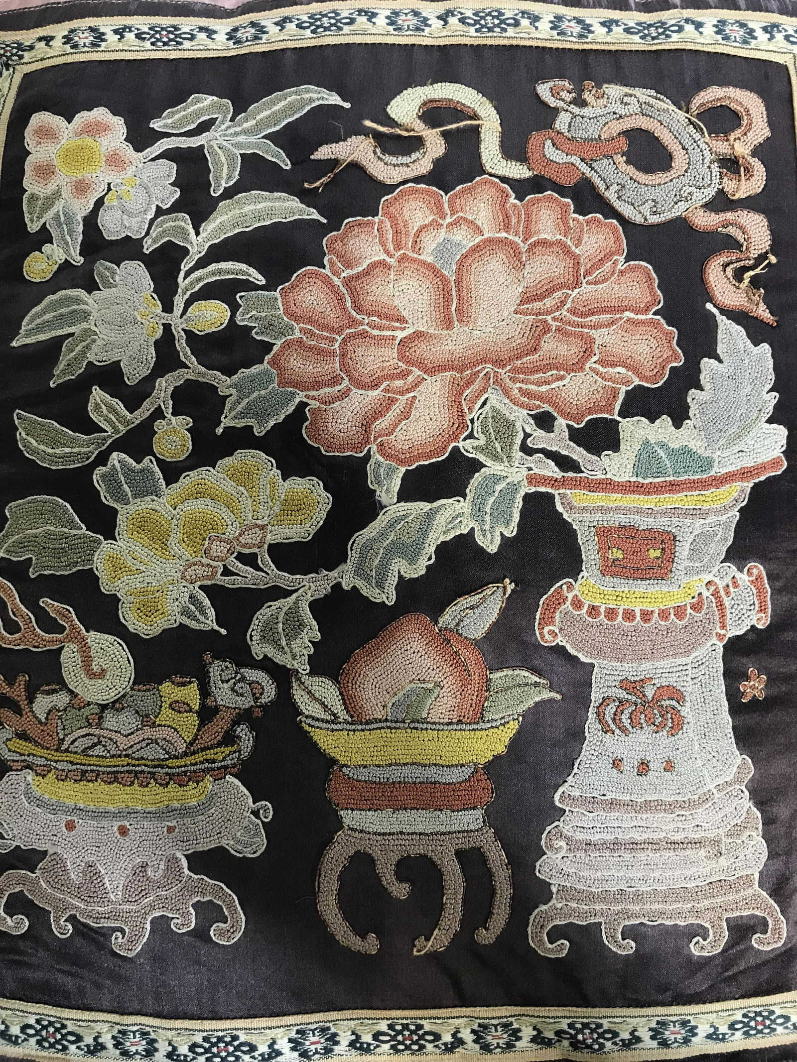 Multi Toned Woven Asian Pillow: Pillow contains intricate multi toned floral, leaf, vine, and vase detail. Asian pillow, throw pillow, decorative pillow, decorative arts, home decor. Piece measures approximately 14 inches tall 12 in