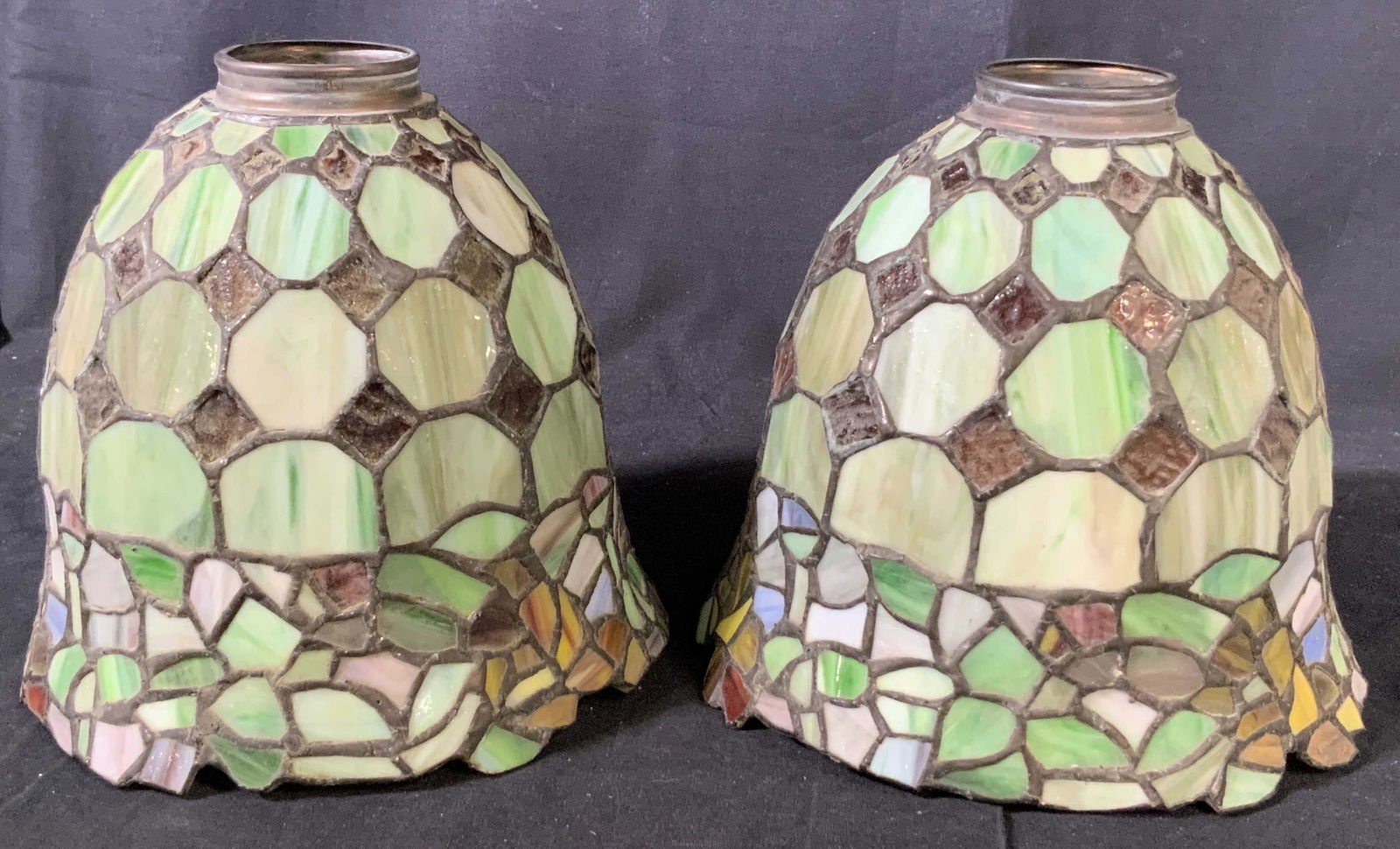 Set of Two Stained Glass Shades: Set of two stained glass shades for lamps, classic green and red pattern through the main body, with the edges being an abstract floral collage pattern with purposely haphazard edges, each lamp measur