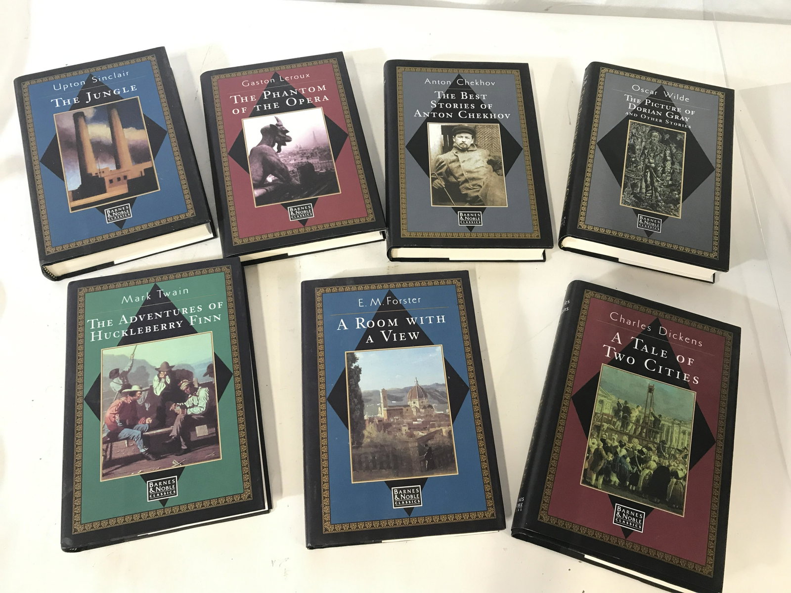 Collection 7 BARNES & NOBLE Famous Classic Lit.: Hard Cover books include Upton Sinclair THE JUNGLE, Gaston Letroux THE PHANTOM OF THE OPERA, Anton Chekhov THE BEST STORIES OF ANTON CHEKHOV, Oscar Wilde THE PICTURE OF DORIAN GRAY THE MODEL MILLIONAI