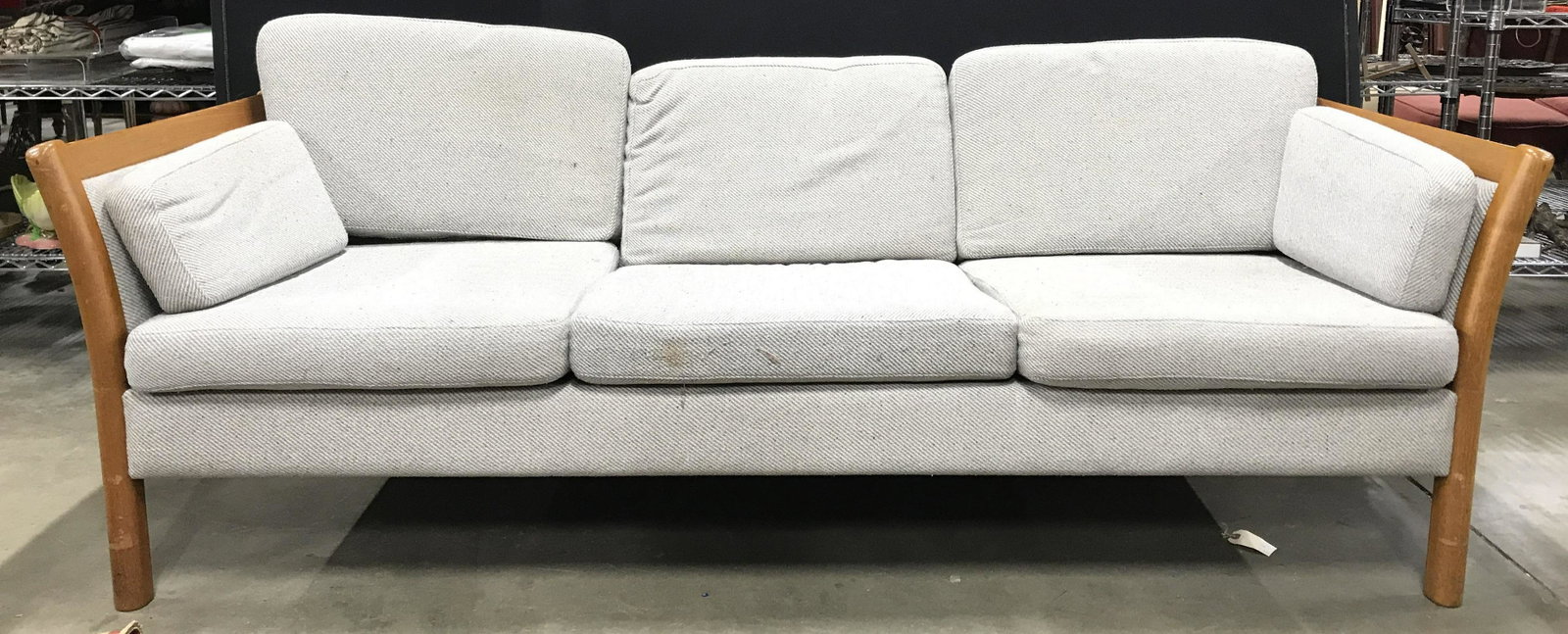 STOUBY POLSTER Mid Century Modern Sofa: Underside of sofa has tag which reads STOUBY POLSTER MADE IN DENMARK. Sofa has wooden frame and light slate toned upholstery. Vintage sofa, 70’s sofa, mid century modern sofa, mid century modern cou