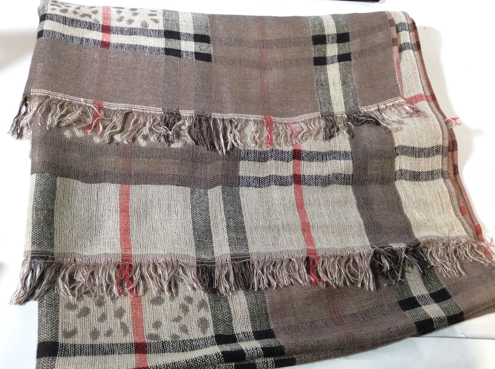 Burberry Style Cotton Plaid & Spotted Wrap: Woven cotton, labeled with fabric, beige with black and red plaid on beige, Center Spotted print similar to an animal print. 28 x 70 in. Semi transparent cloth. Ladies Wearables, Wrap, shawl, Lightwei