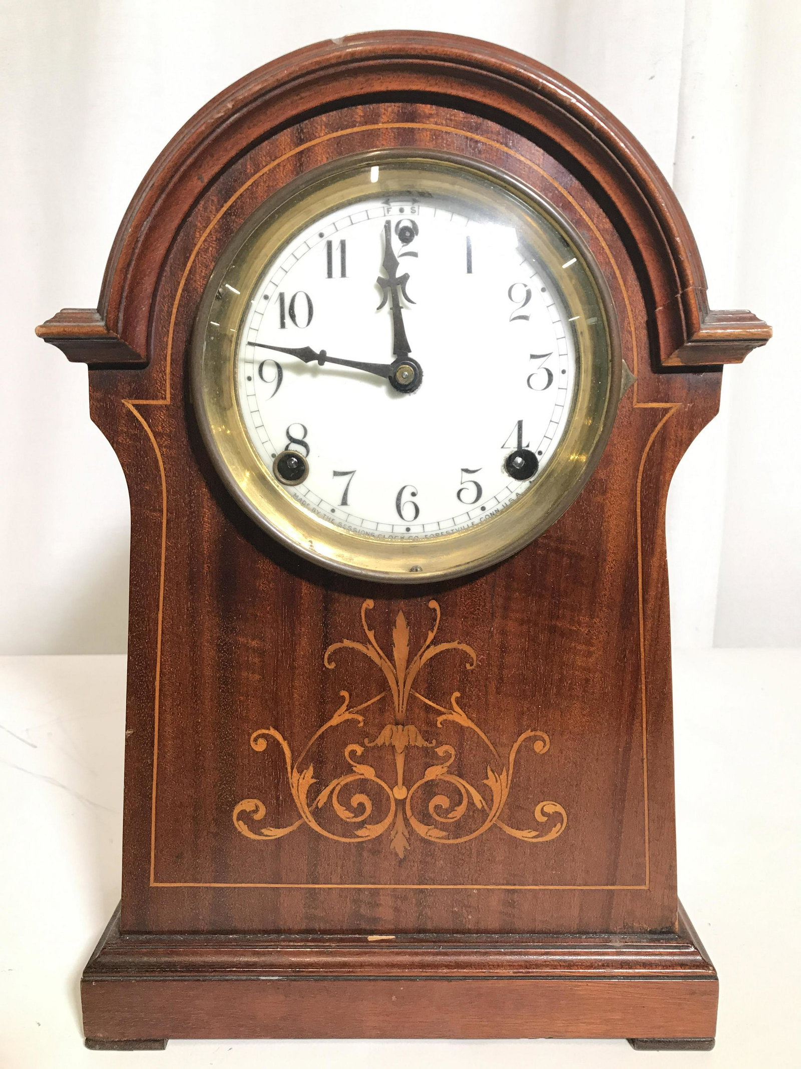 THE SESSIONS CLOCK Early 1900’s Mantle Clock: Clock face reads MADE BY THE SESSIONS CLOCK CO FORESTVILLE CONN USA. Piece is circa early 1900’s. Appears to be antique. Clock is wooden with carved detail. Clock face window opens. Piece has ornate