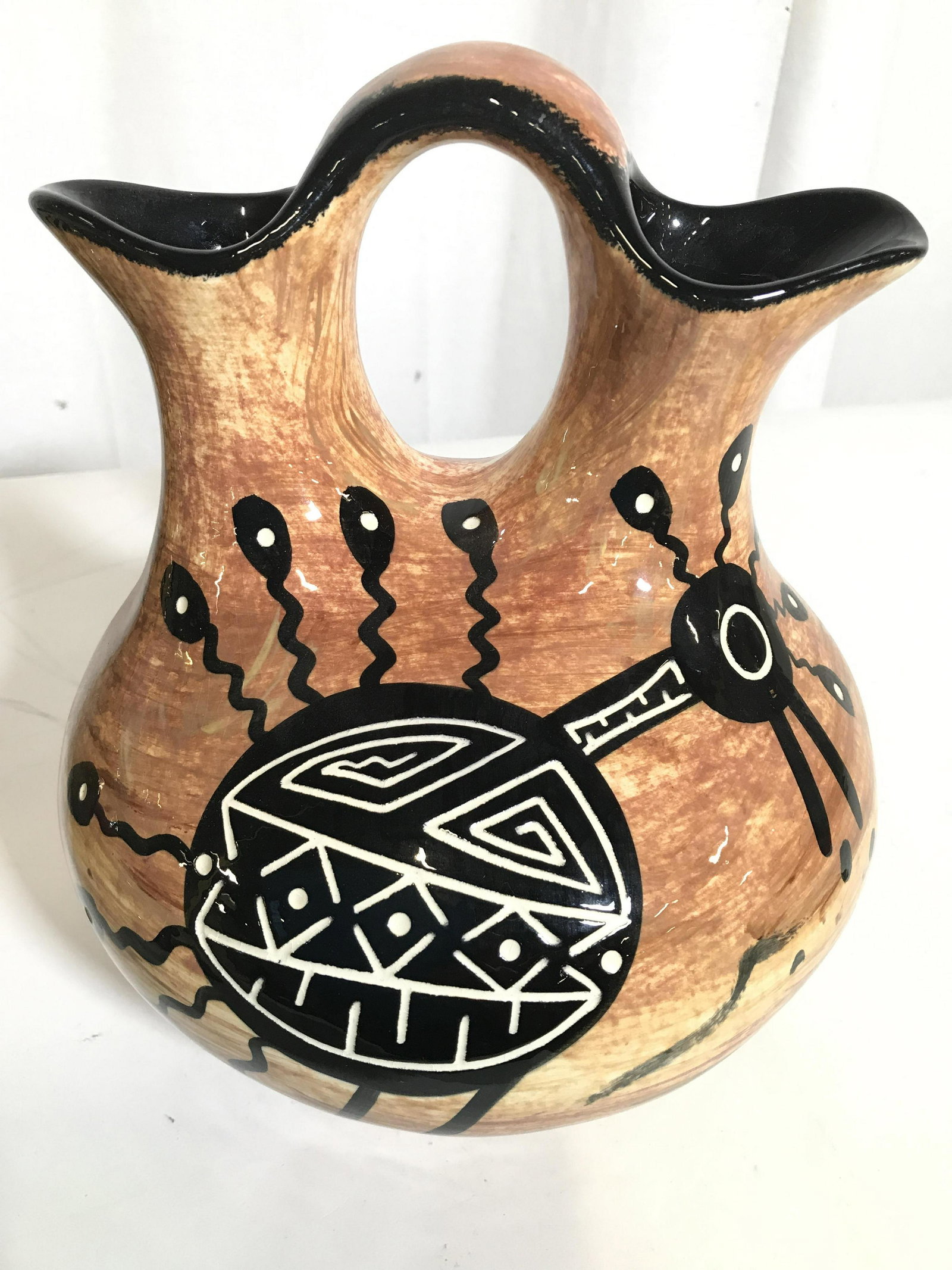 Signed MANA Double Mouthed Ceramic Vase: Underside of piece is signed MANA & marked USA. Vase is double mouthed. Vase has burnt sienna tone with black toned detail. American pottery, Mana vase, signed vase, double mouthed vase, tableware, ta