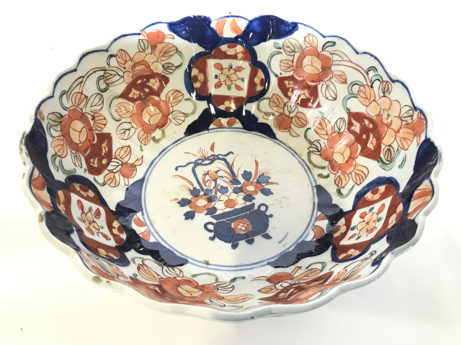 Vintage IMARI Asian Porcelain Bowl: Bowl is vintage possibly antique. Piece is hand painted with multi toned floral & leaf Detail. Piece measures approximately 9.5 inches wide 4 inches tall. Piece has 2 painted rings around base. Asian 