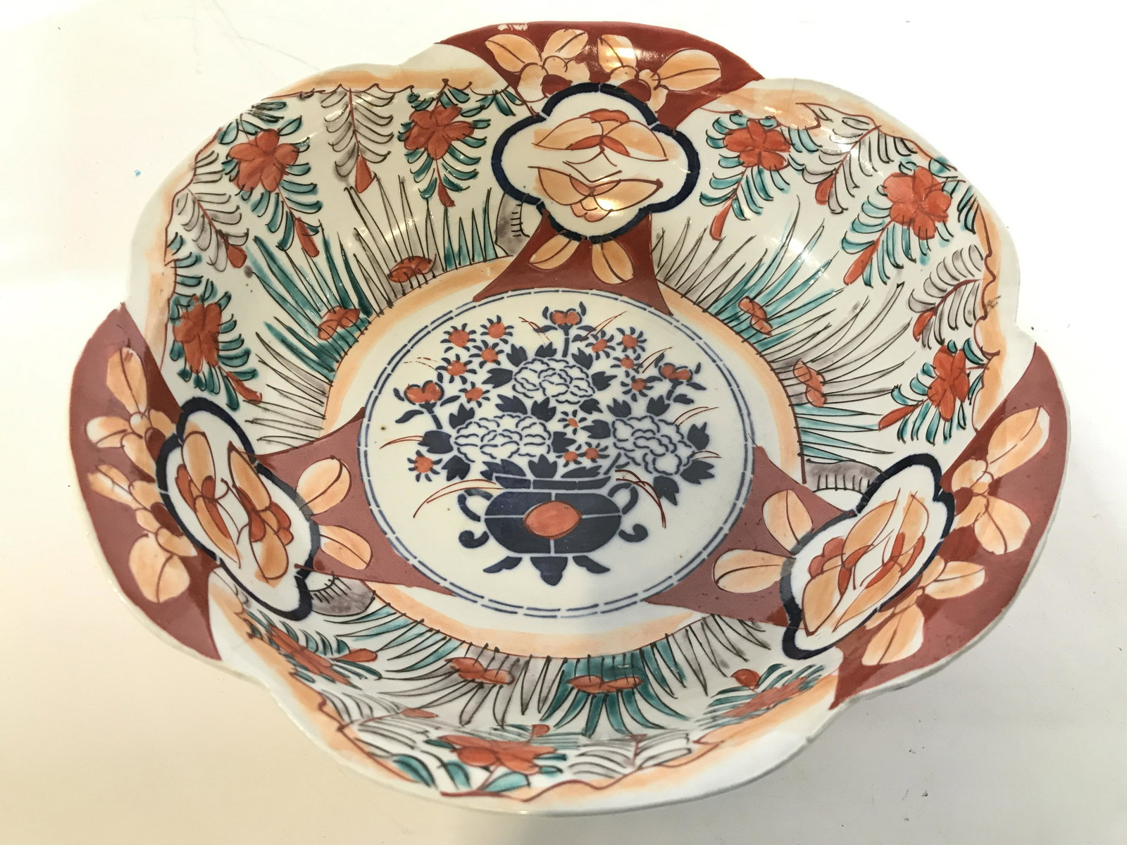 Vintage SIGNED IMARI Asian Porcelain Bowl: Bowl is vintage possibly antique. Piece is signed with Asian characters on underside. Piece is hand painted with multi toned floral & leaf Detail. Piece measures approximately 9.5 inches wide 3.5 inch