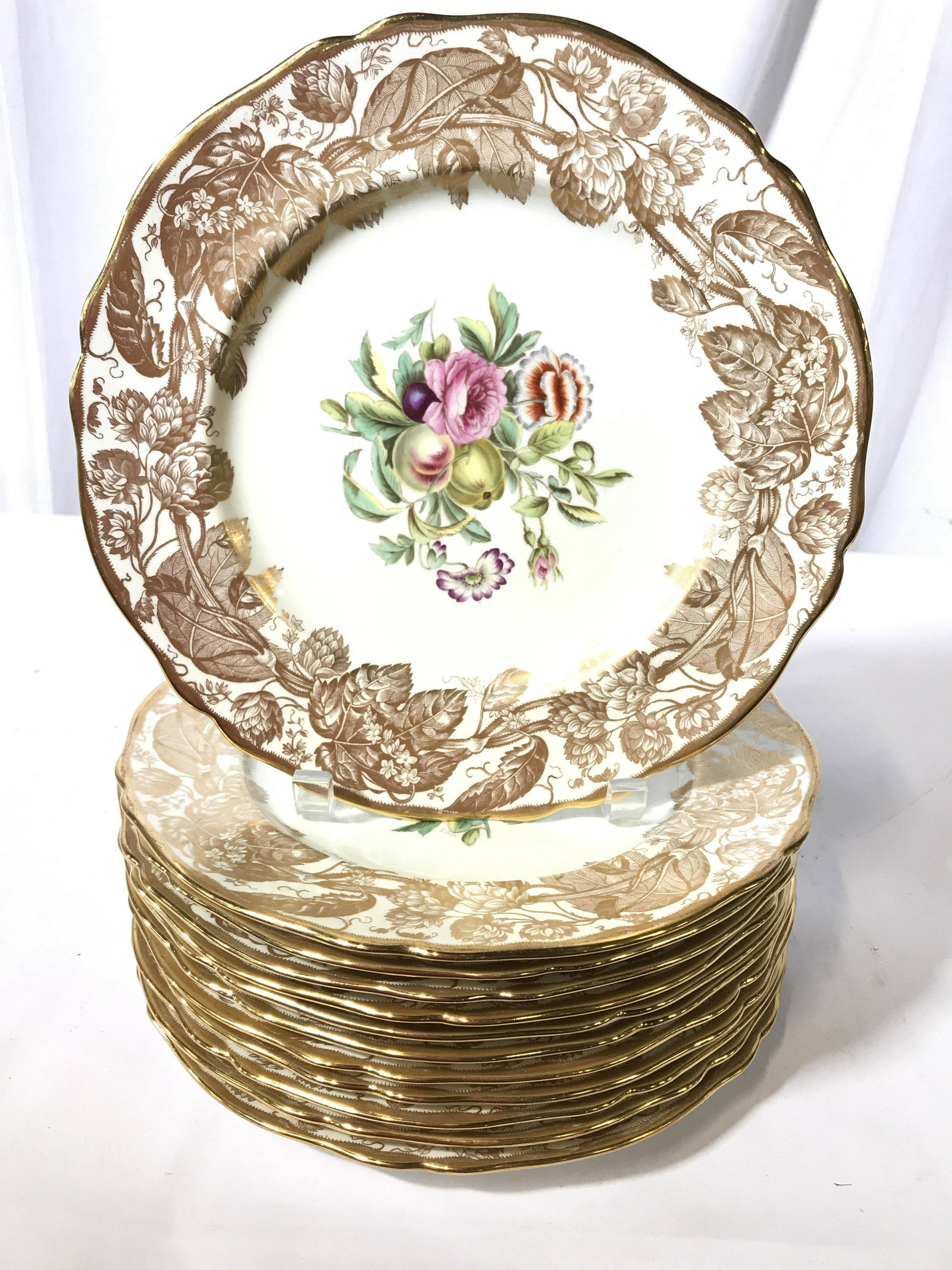 Set 12 TIFFANY Spode Porcelain Dinner Plates: Each measures 10.5 inches diameter, each marked Spode Copelands China, England Tiffany and Co New York, set of 12 place settings, underplate, dinner service, each plate has wide gilded border of leave
