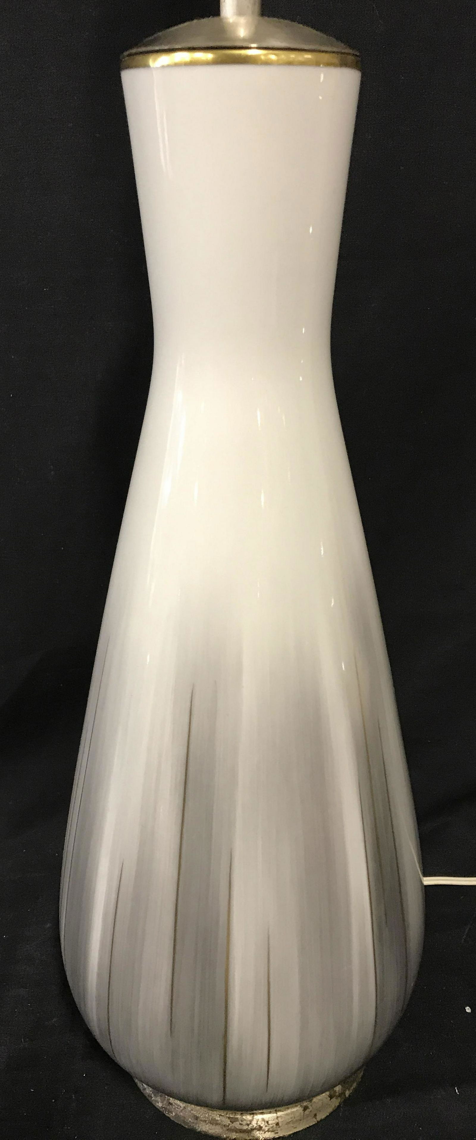 Multi Toned Tabletop Lamp: Multi toned table top lamp, possibly vintage. White to gray Gradient with gold toned highlights. Measures approx 30 inches H, and 7 inches W. Wear is consistent with age and use. Lamps, lights, lighti